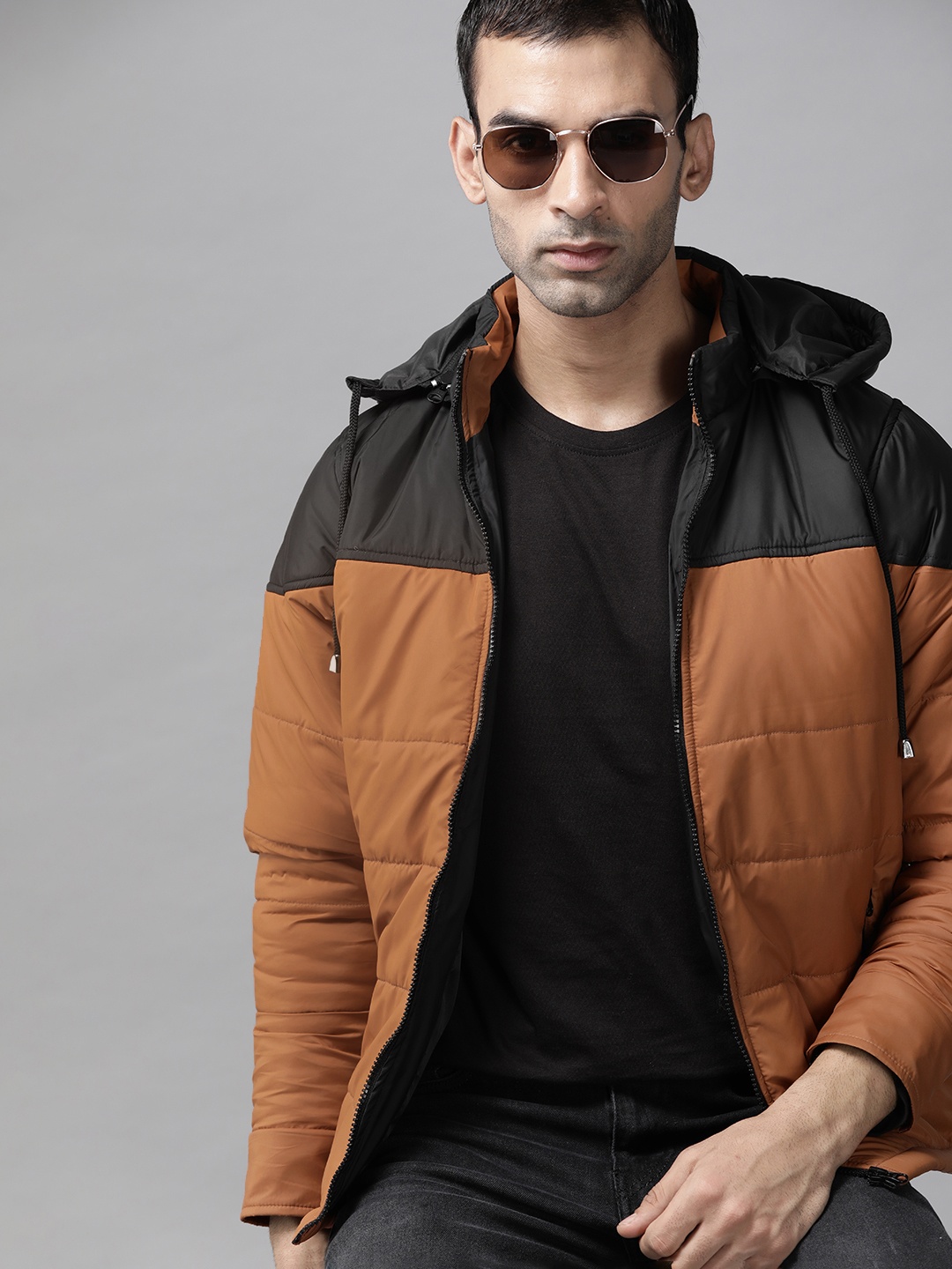 

Roadster Men Mustard Brown & Black Colourblocked Padded Jacket with Detachable Hood