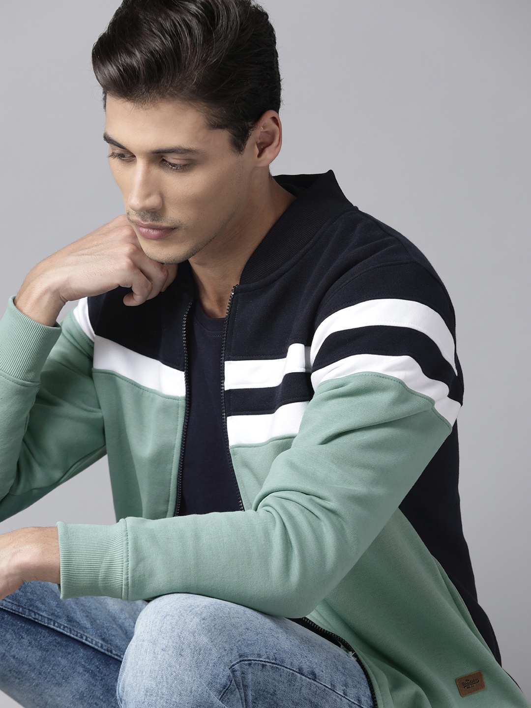 

Roadster Men Green & Navy Blue Colourblocked Bomber Jacket