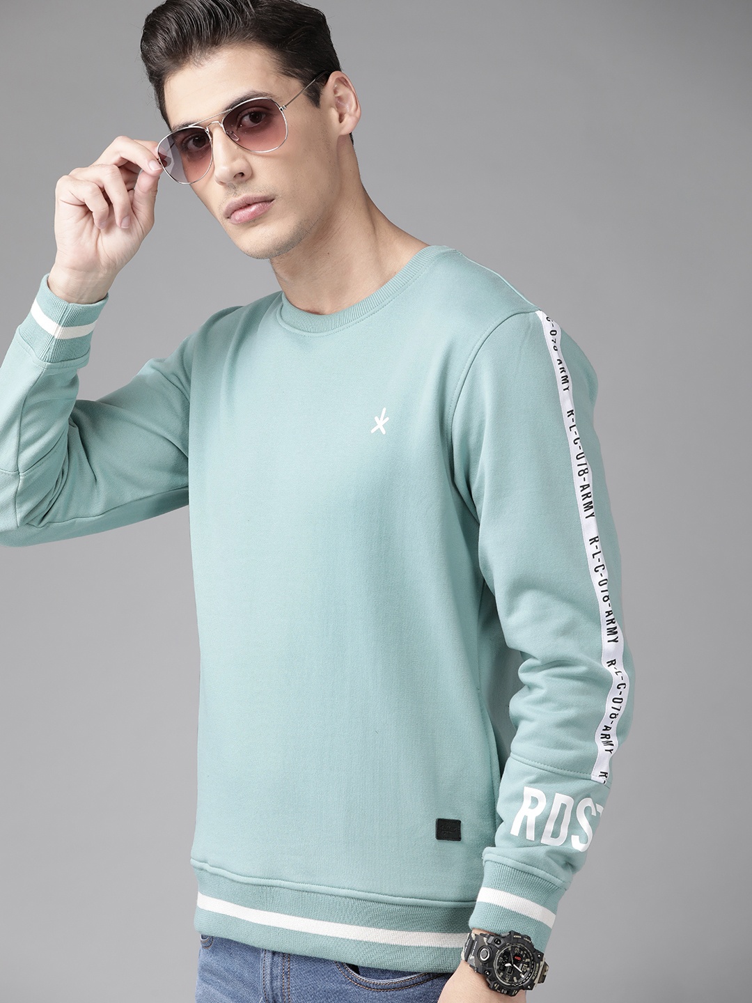 

Roadster Men Blue Solid Sweatshirt