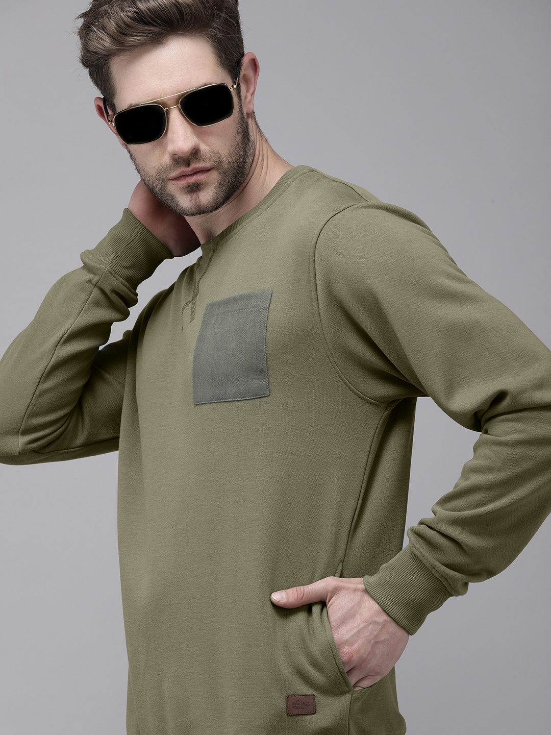 

Roadster Men Olive Green Solid Sweatshirt