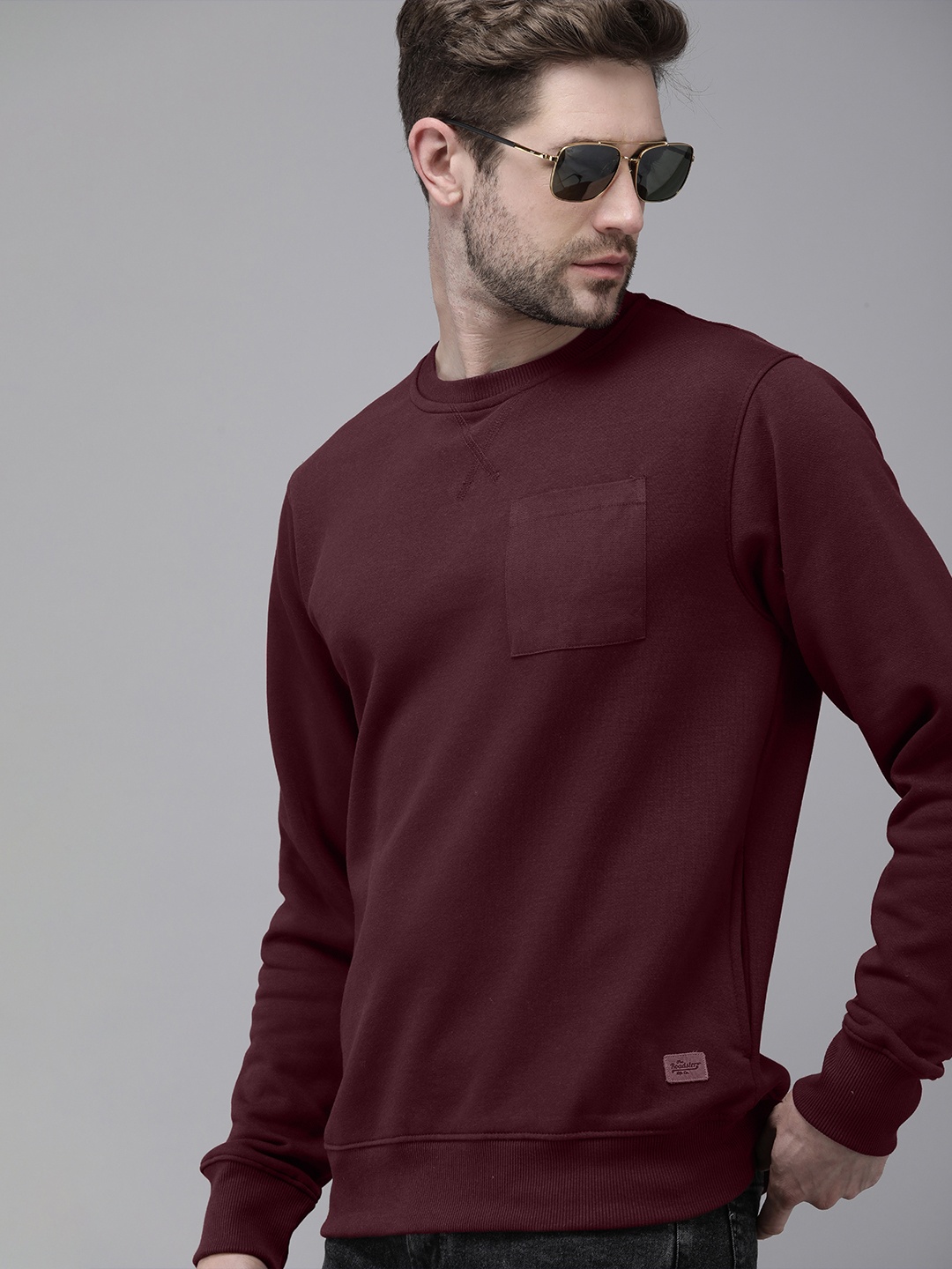 

Roadster Men Burgundy Solid Sweatshirt