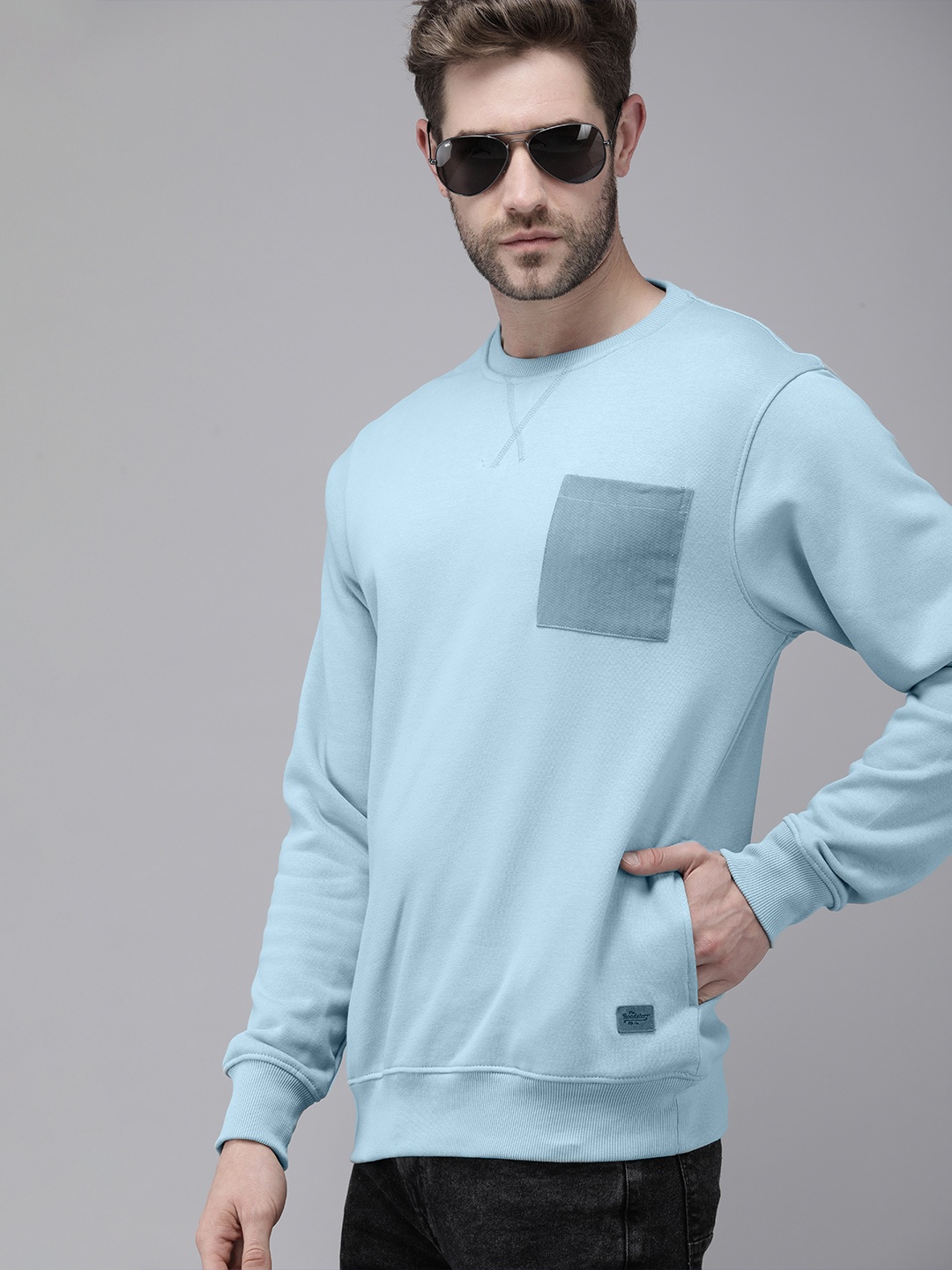 

Roadster Men Blue Solid Sweatshirt