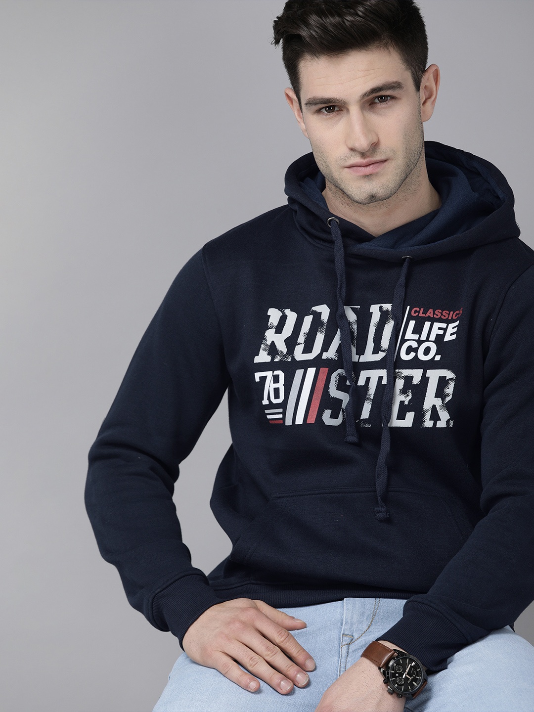 

Roadster Men Navy Blue Brand Logo Printed Hooded Sweatshirt