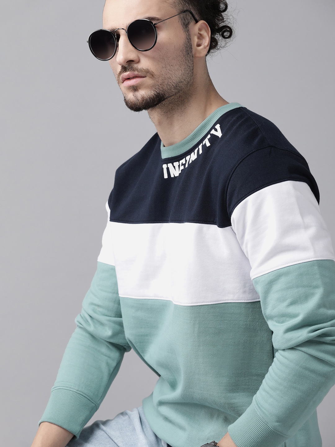 

Roadster Men Sea Green & Navy Blue Colourblocked Sweatshirt