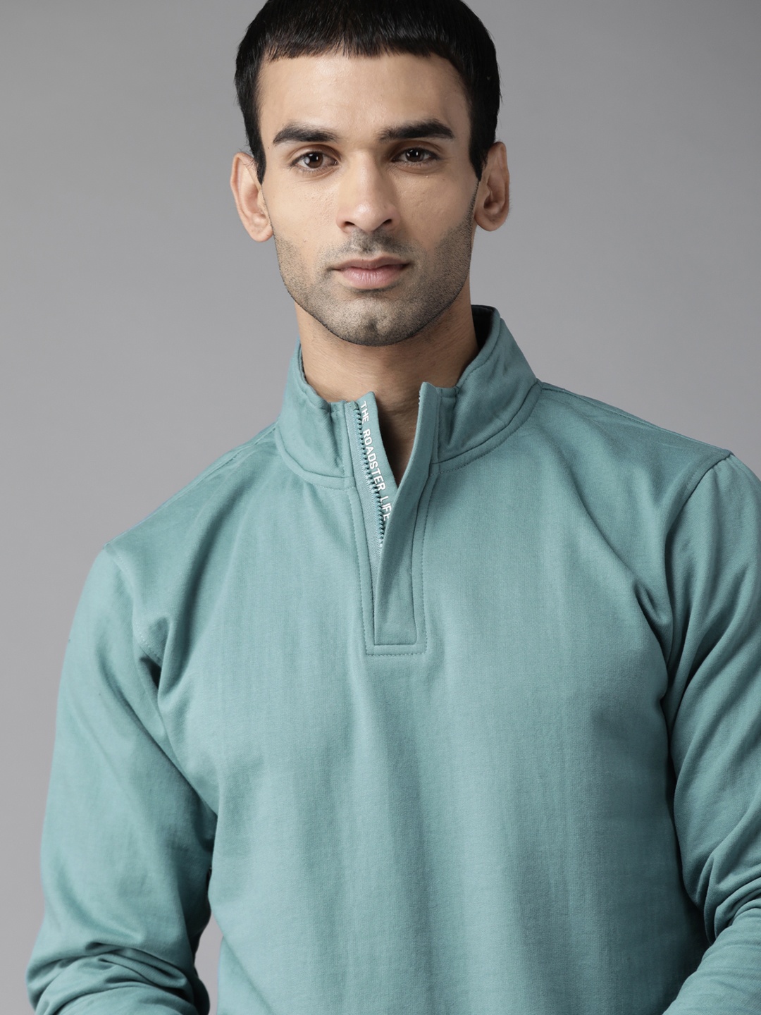 

Roadster Men Blue Solid Sweatshirt