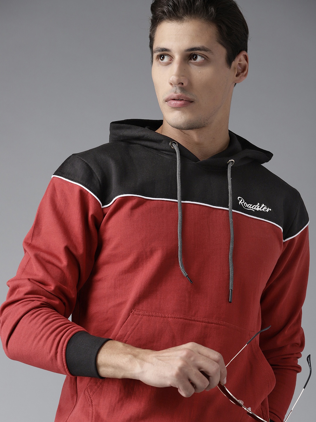 

Roadster Men Rust Red & Black Colourblocked Hooded Sweatshirt