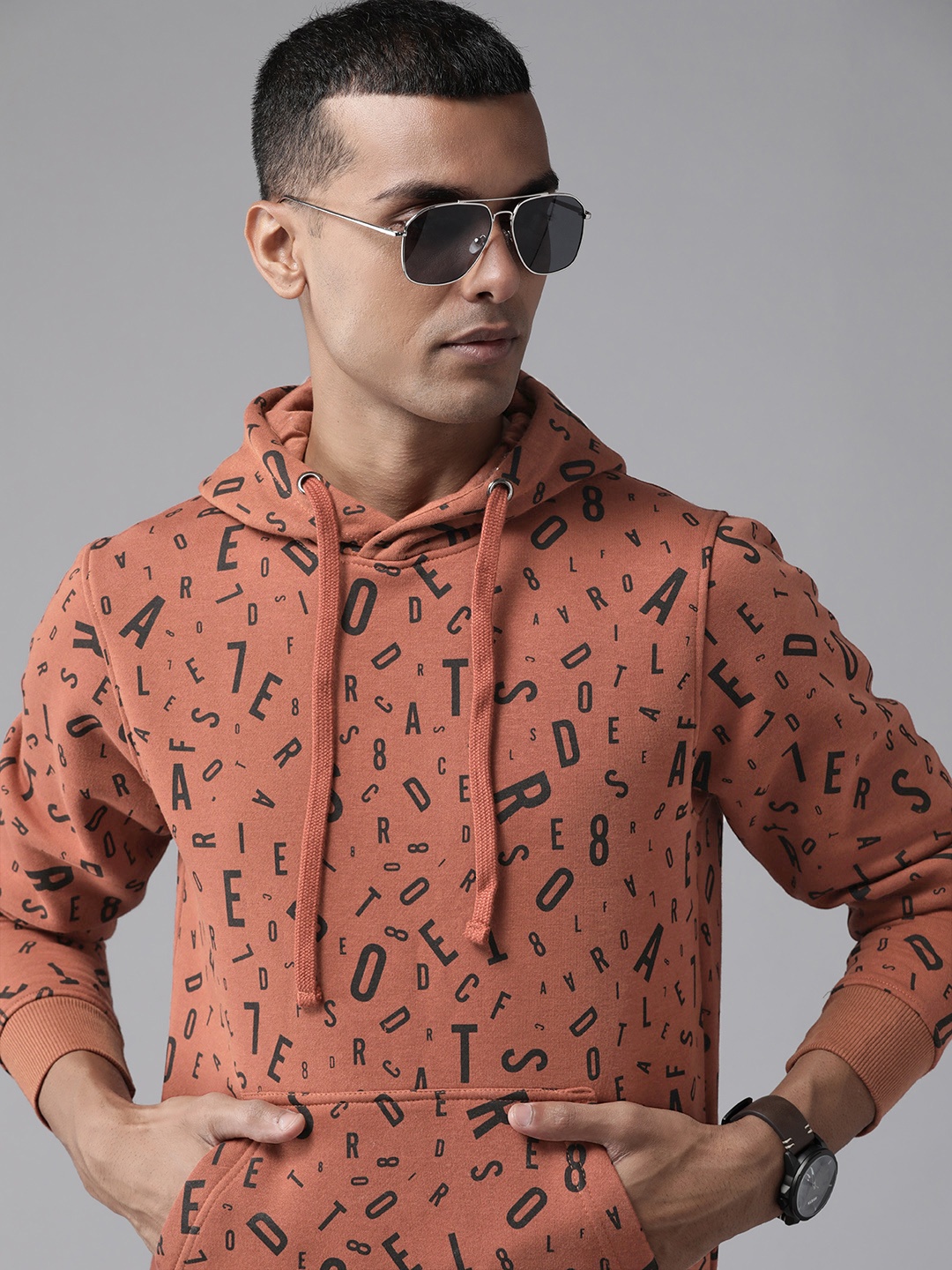 

Roadster Men Rust Brown & Black Printed Hooded Sweatshirt