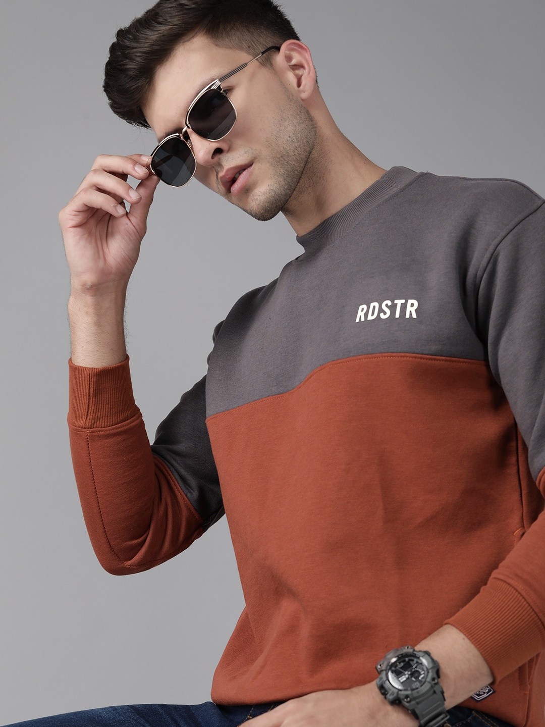 

Roadster Men Charcoal Grey & Rust Orange Colourblocked Sweatshirt