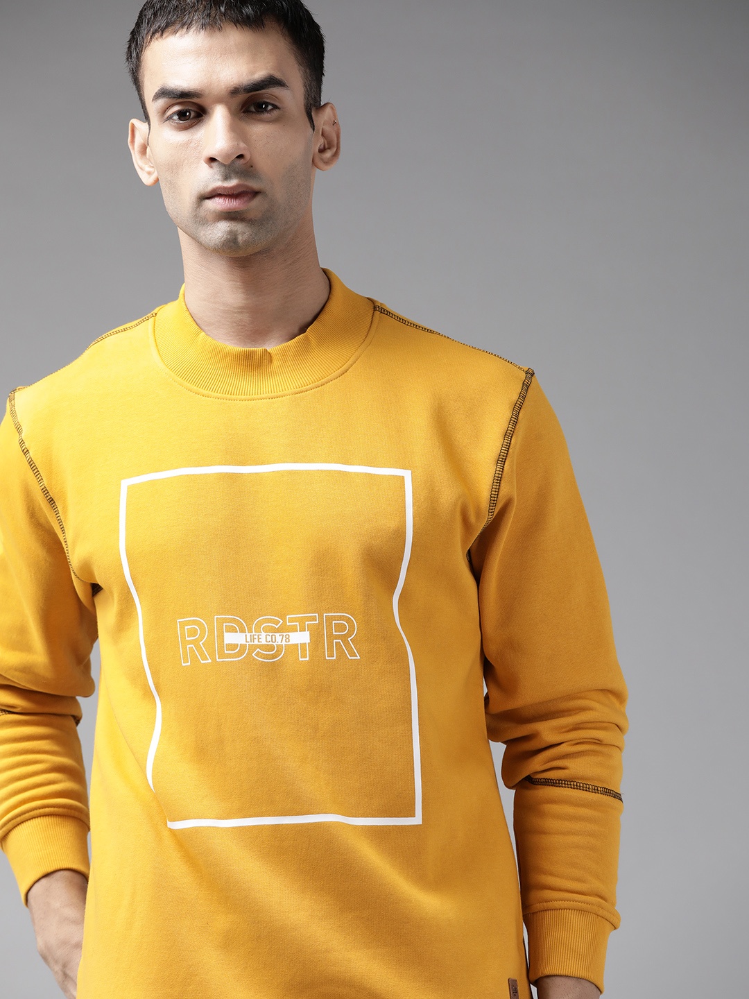 

Roadster Men Mustard Yellow & White Brand Logo Print Sweatshirt