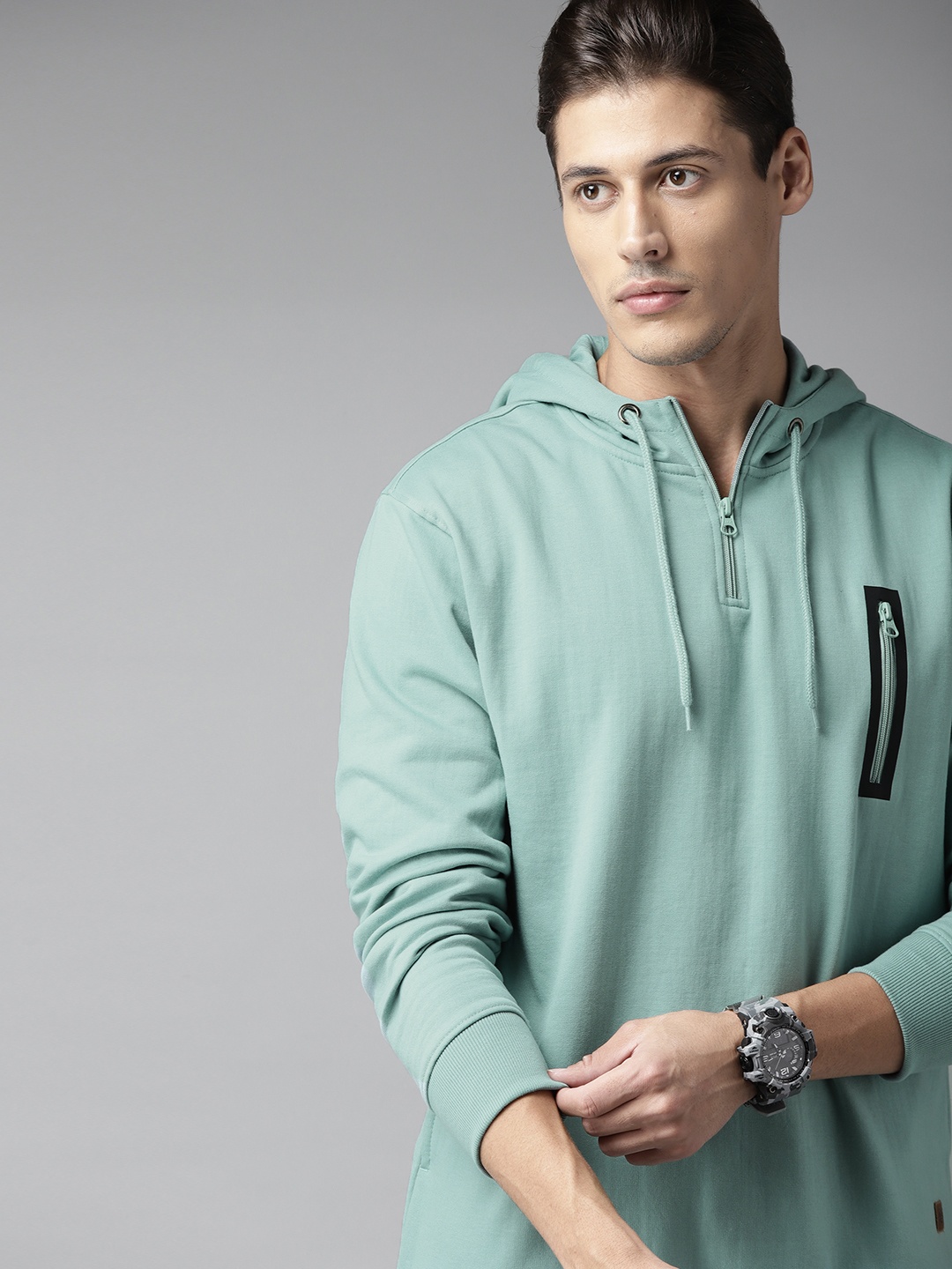 

Roadster Men Sea Green Solid Hooded Sweatshirt