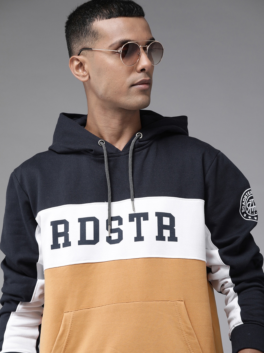 

Roadster Men Brown Colourblocked Hooded Sweatshirt