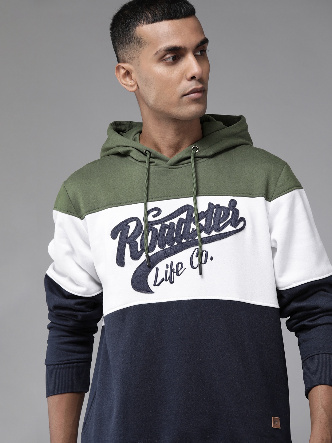 

Roadster Men Navy Blue Colourblocked Brand Logo Printed Hooded Sweatshirt