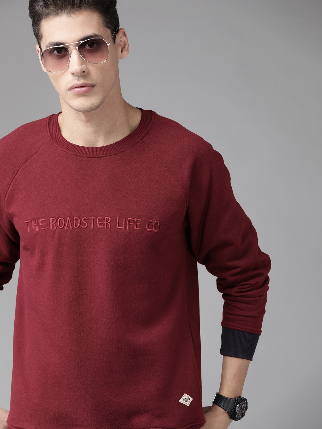 

Roadster Men Maroon Solid Sweatshirt