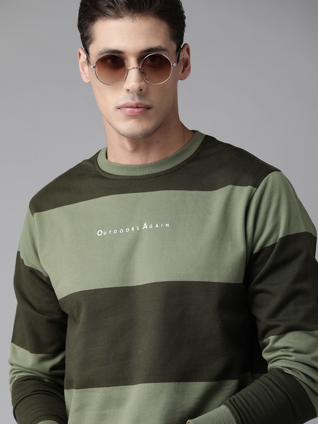 

Roadster Men Green Striped Sweatshirt