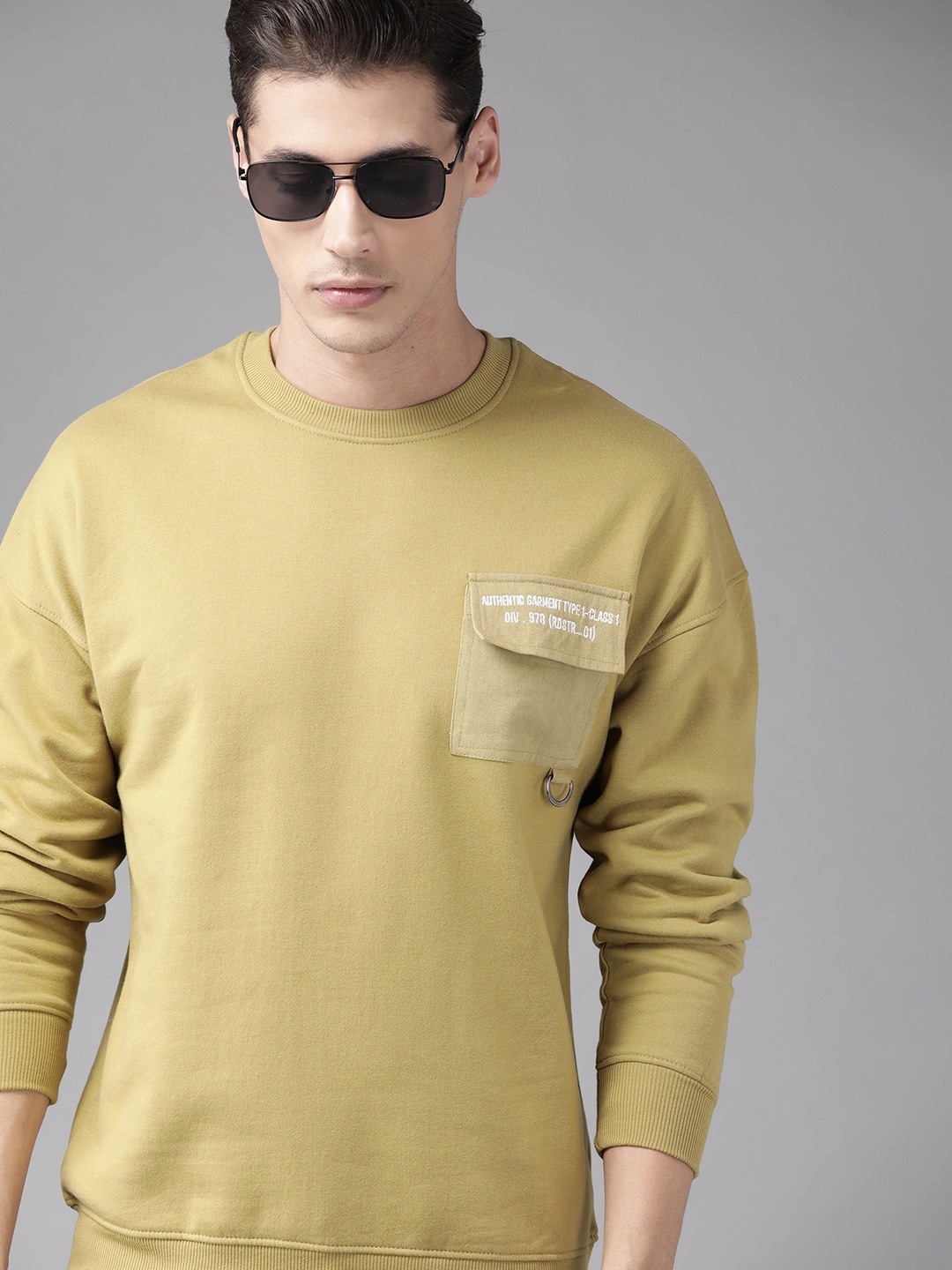 

Roadster Men Khaki Solid Sweatshirt