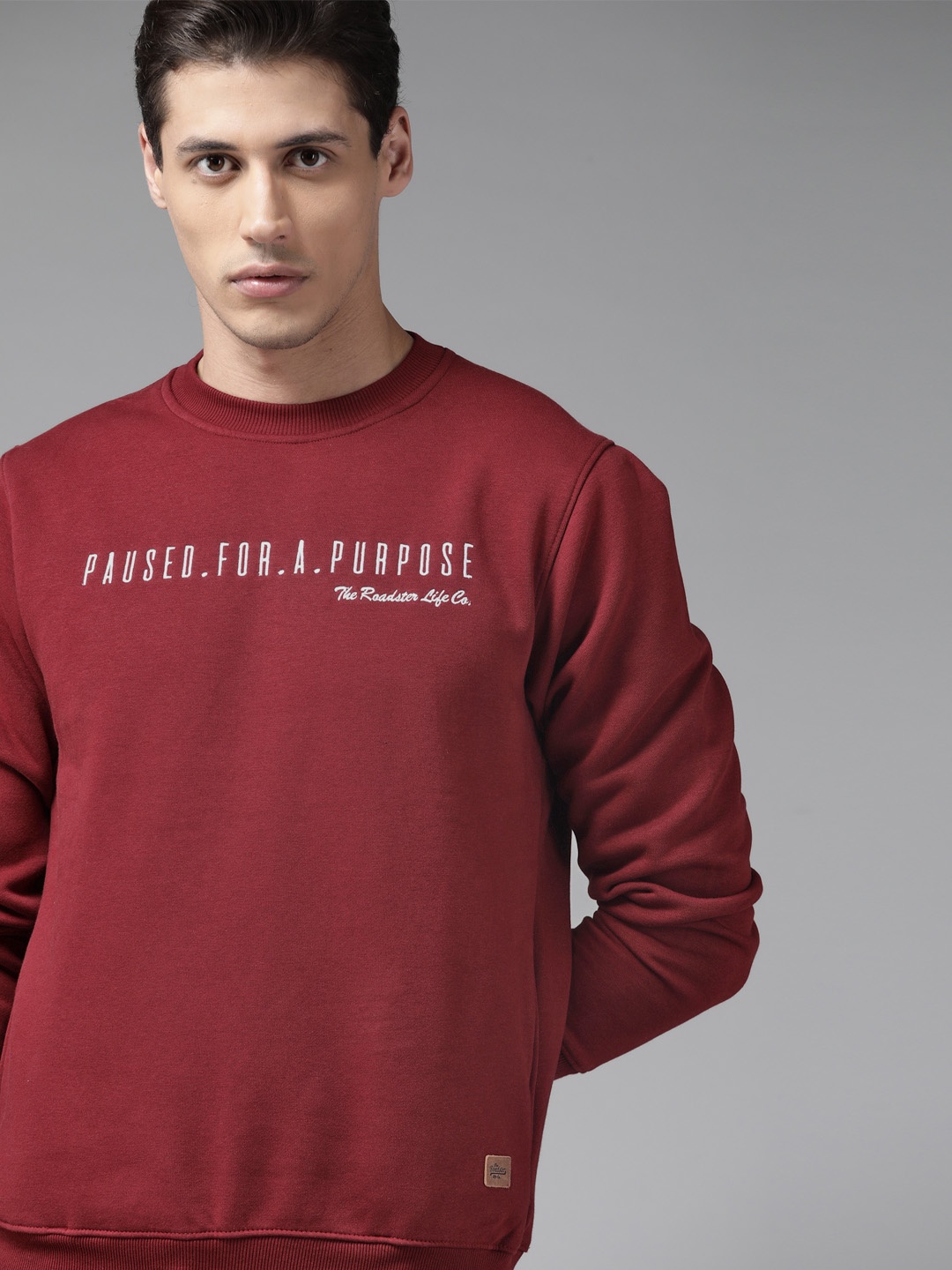 

Roadster Men Maroon Typography Embroidered Sweatshirt