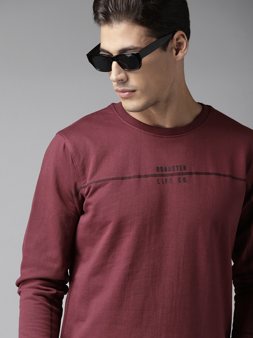 

Roadster Men Burgundy Solid Pullover Sweatshirt