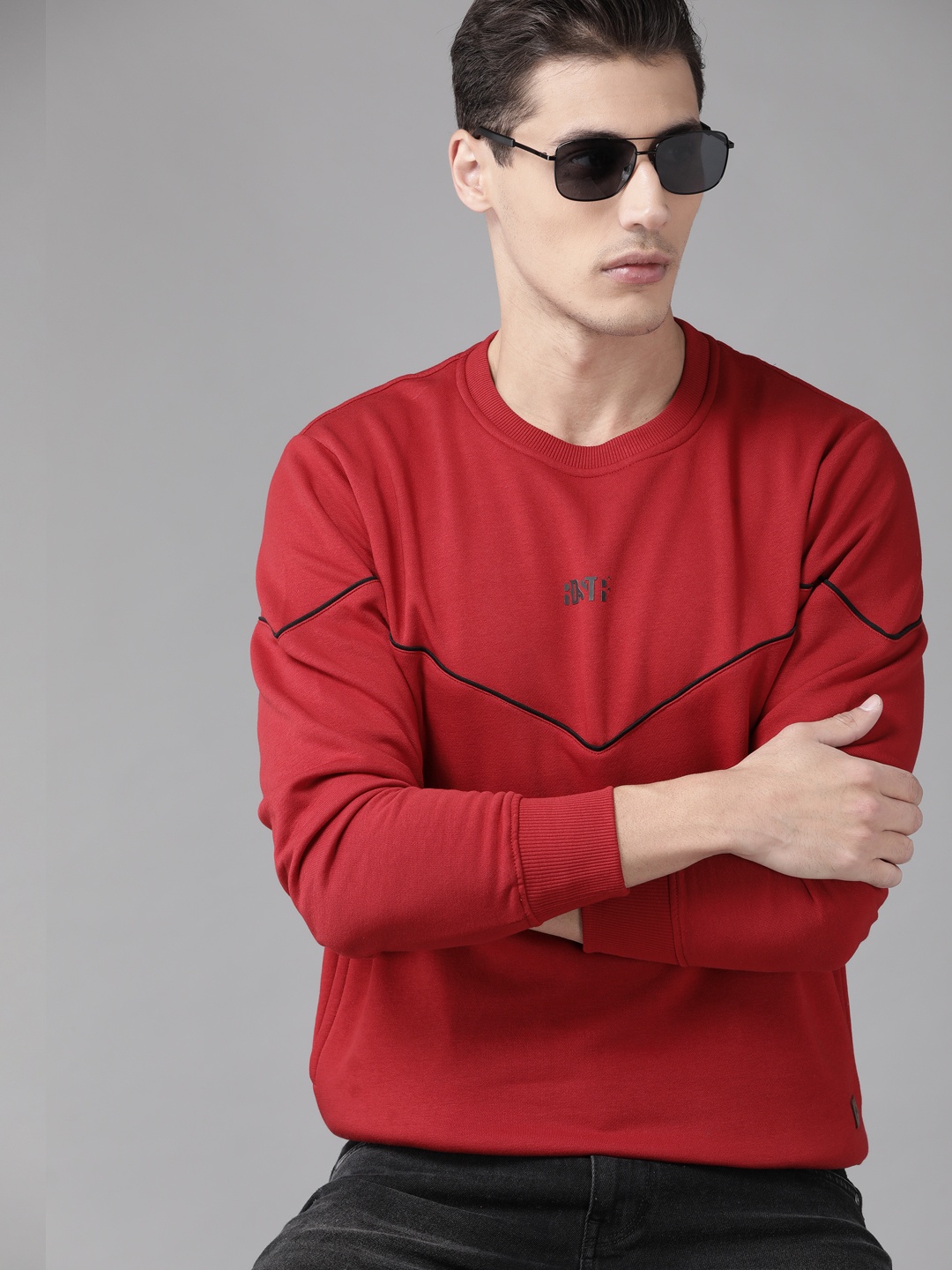 

Roadster Men Red Solid Sweatshirt
