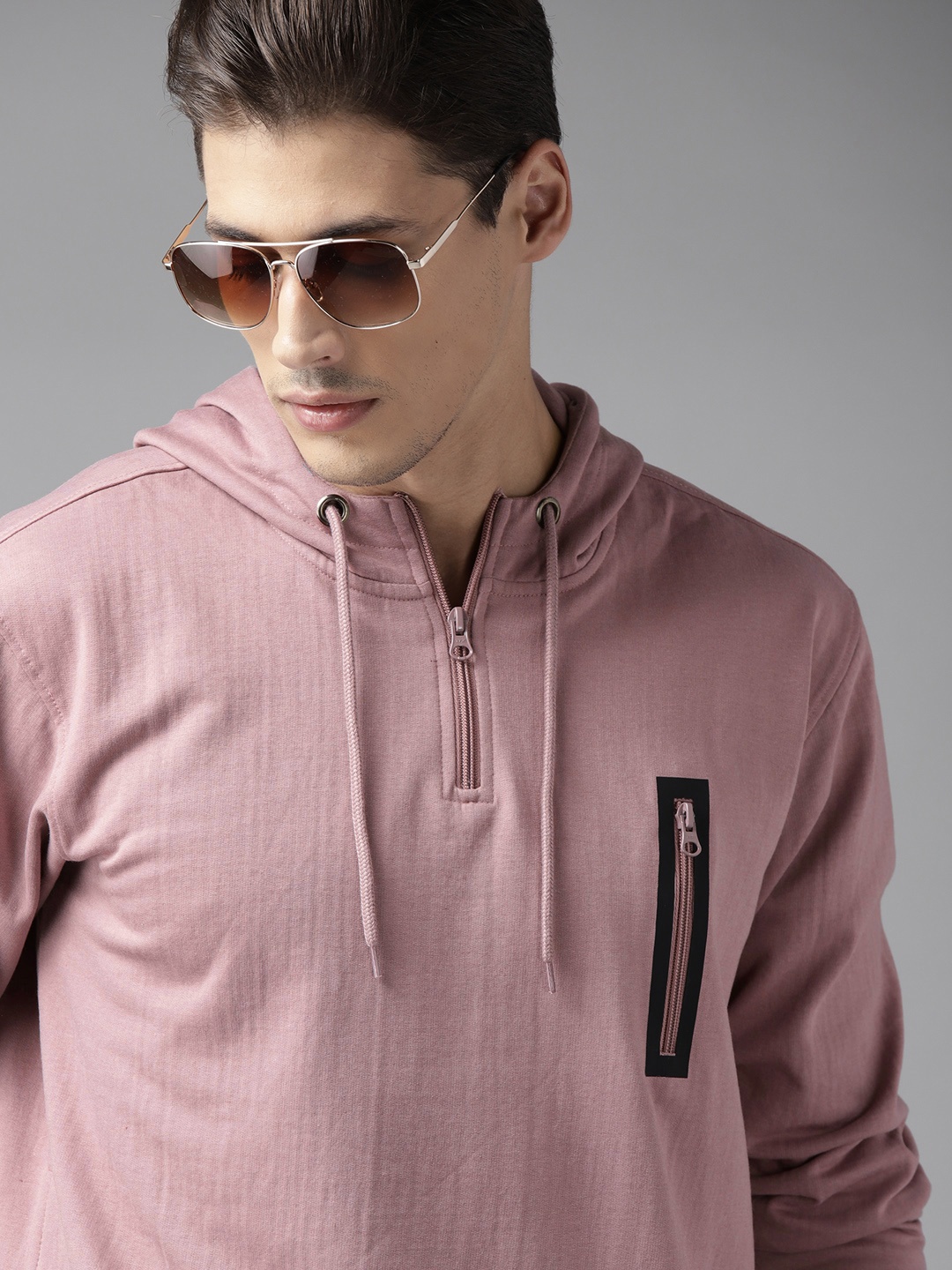 

Roadster Men Mauve Solid Hooded Sweatshirt