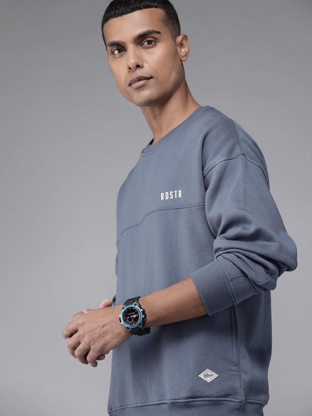 

Roadster Men Blue Solid Sweatshirt