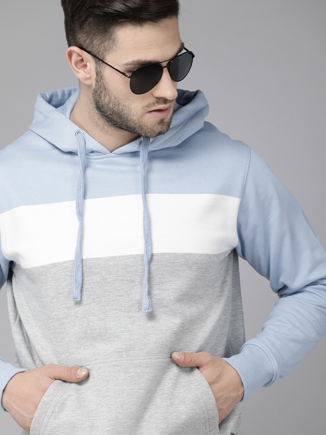 

Roadster Men Blue & Grey Colourblocked Hooded Sweatshirt