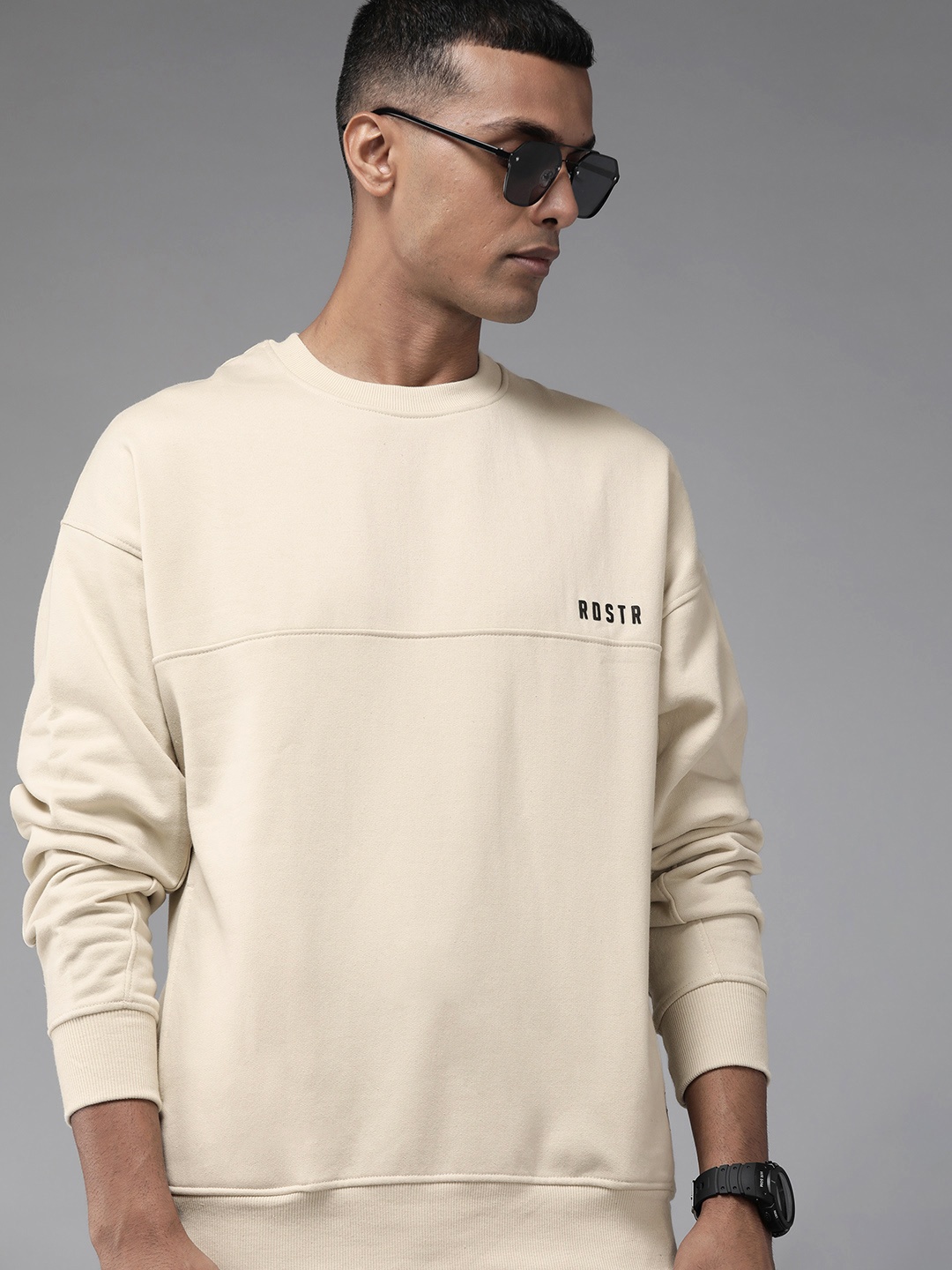 

Roadster Men Beige Solid Sweatshirt