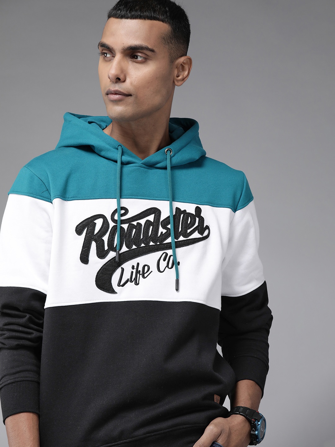 

Roadster Men Teal Green & White Colourblocked Hooded Sweatshirt