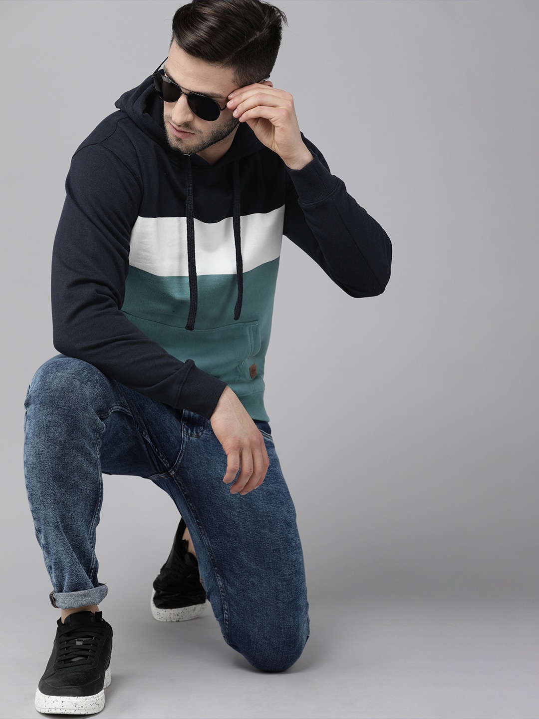 

Roadster Men Navy Blue & Teal Green Colourblocked Hooded Sweatshirt