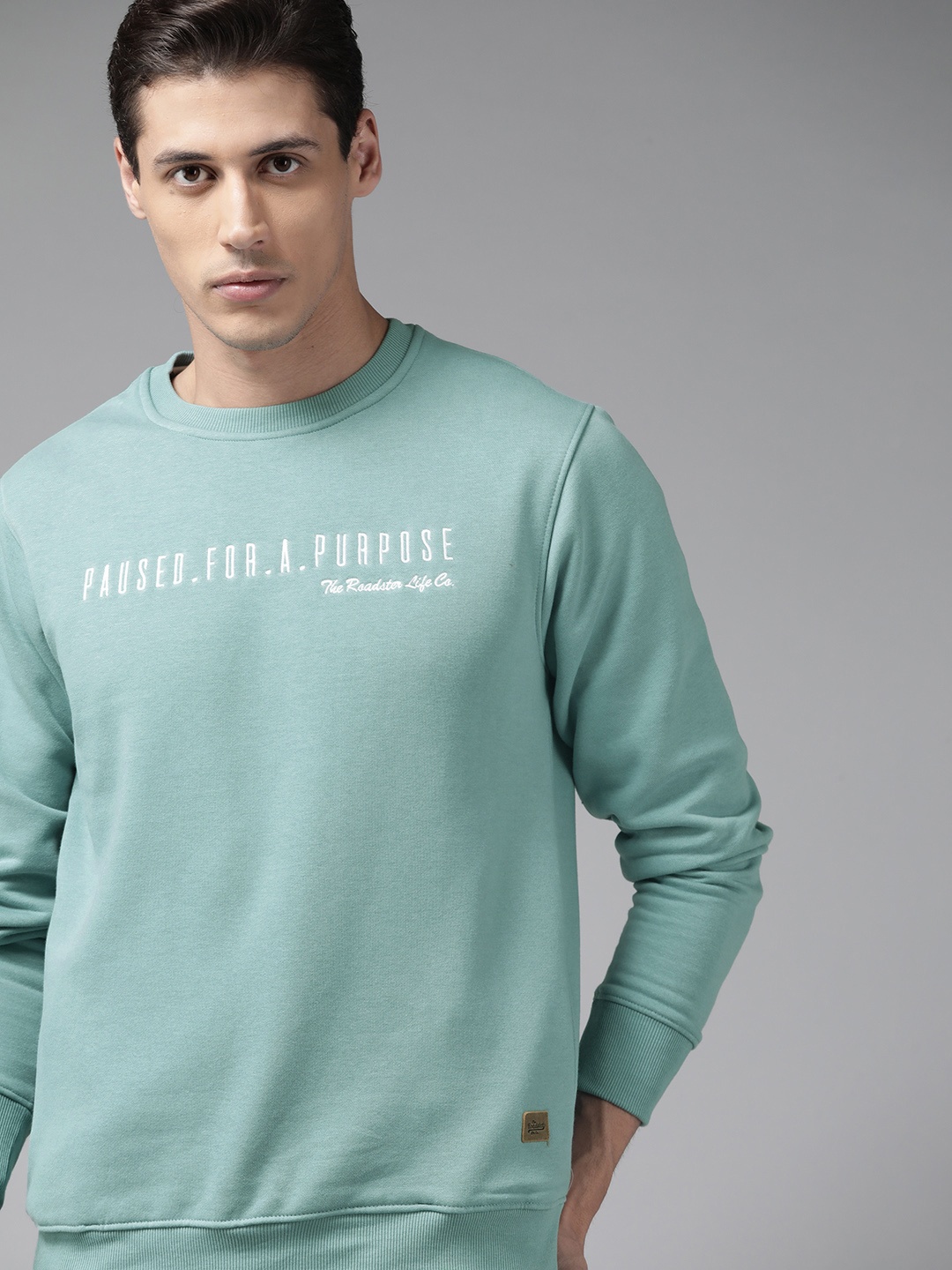 

Roadster Men Turquoise Blue Typography Embroidered Sweatshirt