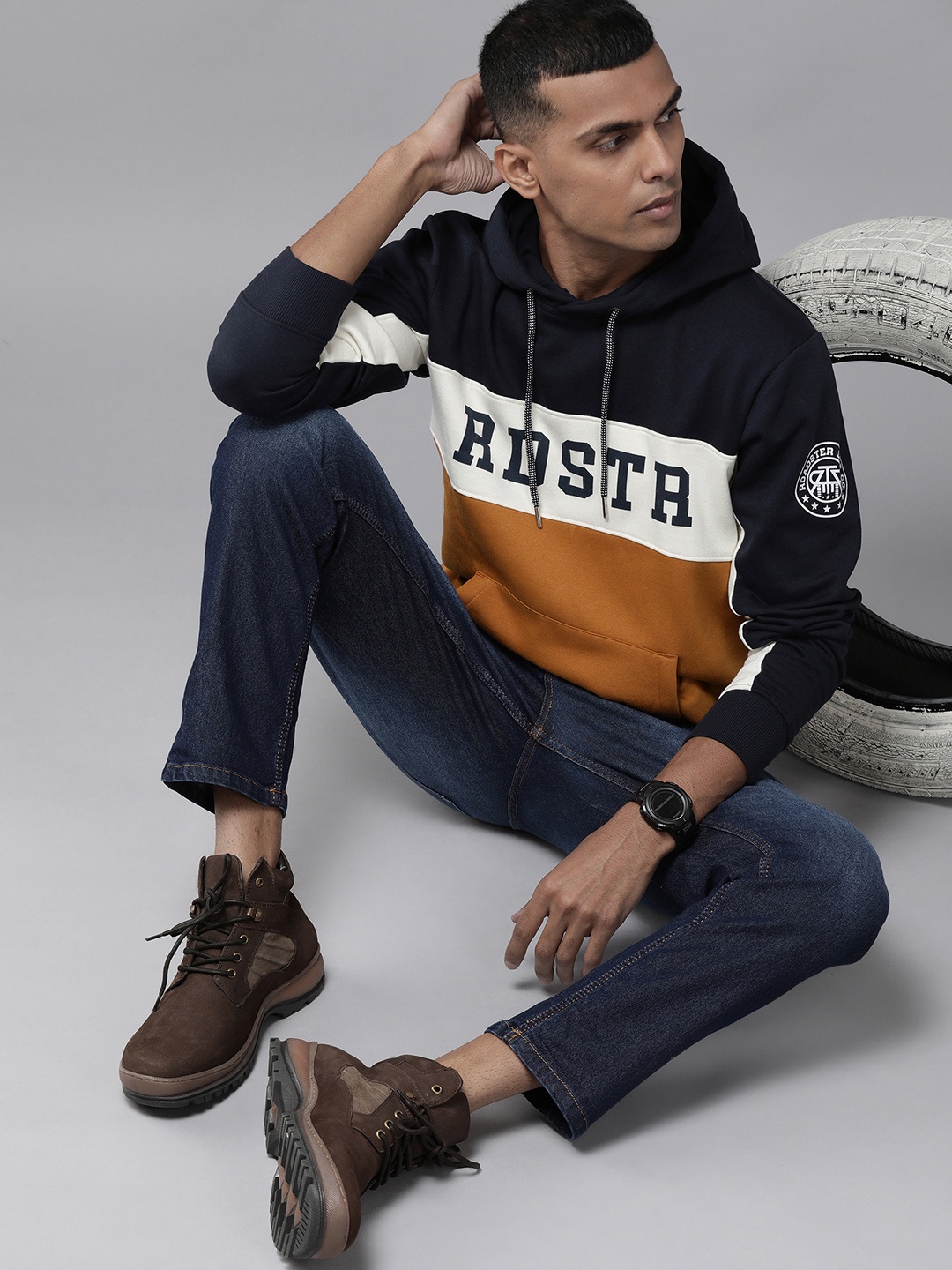 

Roadster Men Brown & White Colourblocked Hooded Sweatshirt