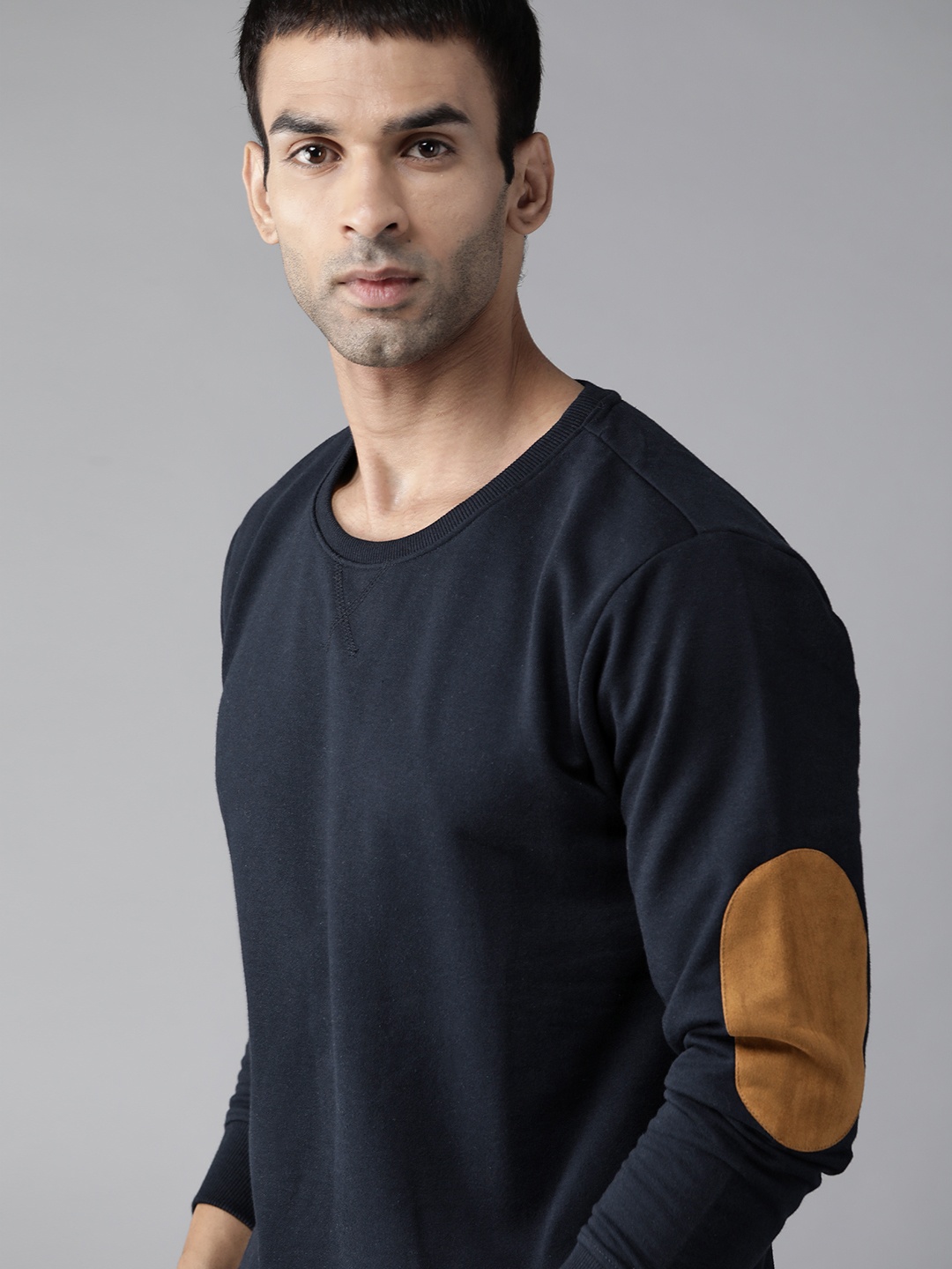 

Roadster Men Navy Blue Solid Sweatshirt