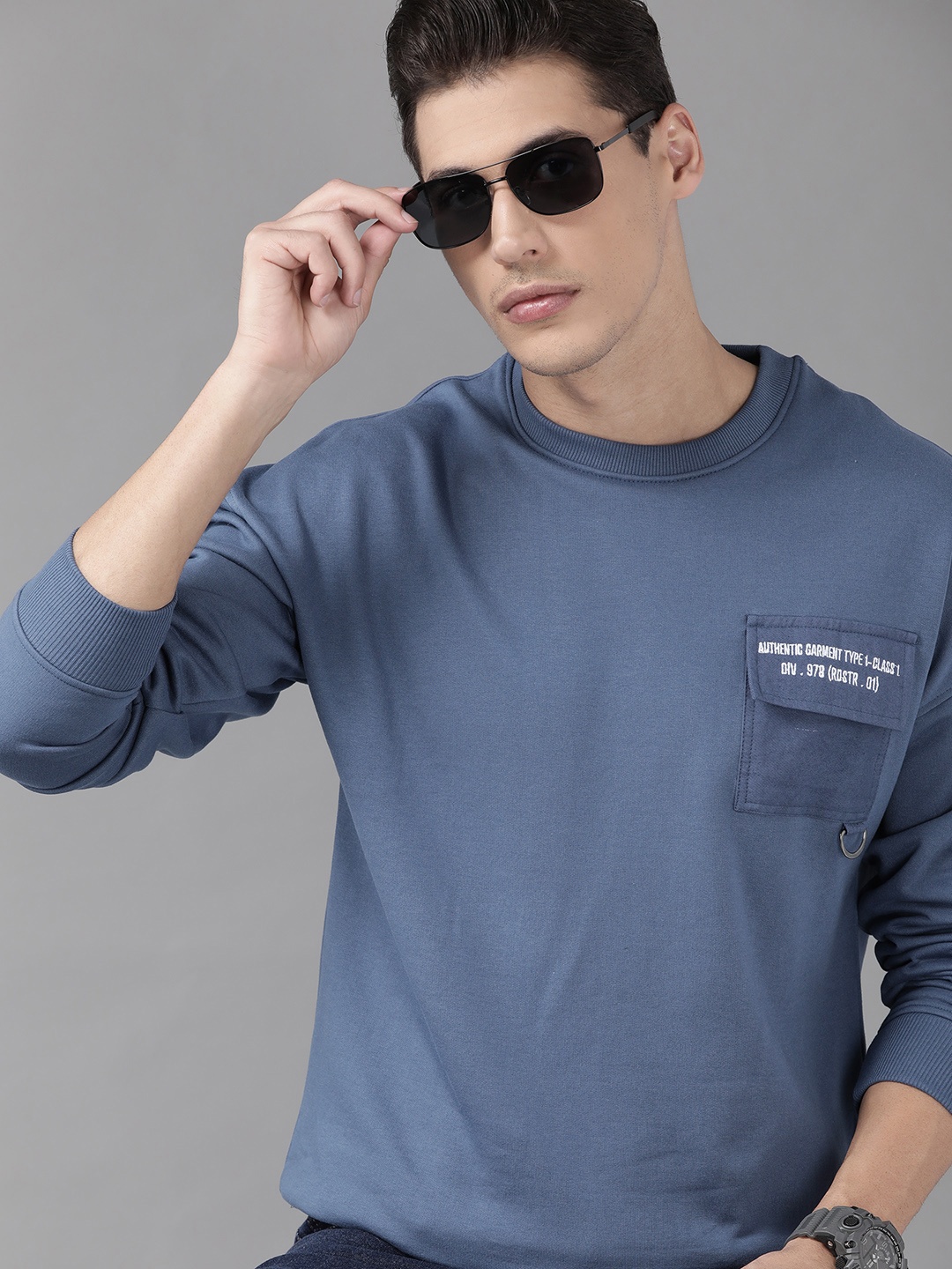 

Roadster Men Blue Solid Sweatshirt