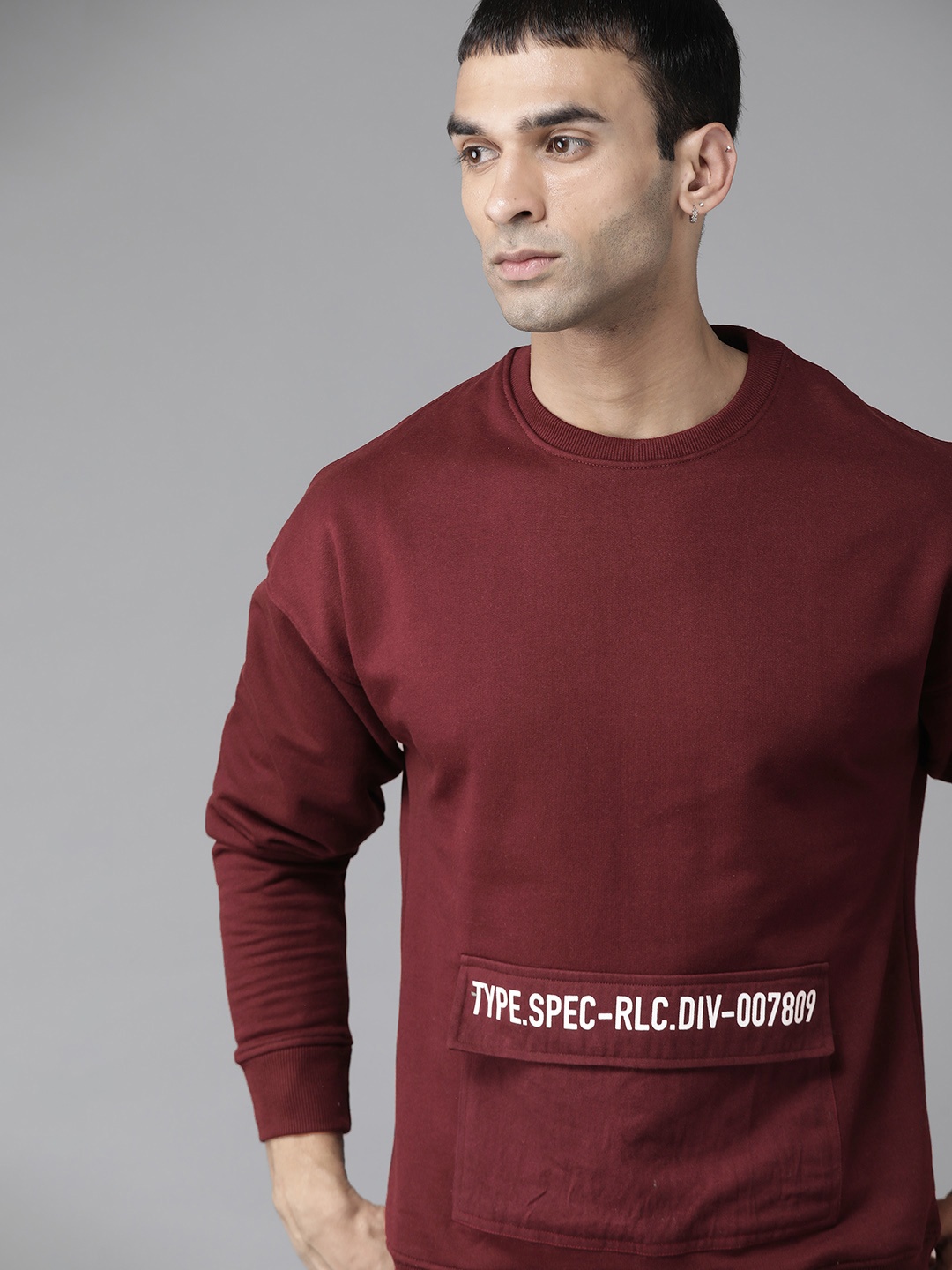 

Roadster Men Burgundy Solid Sweatshirt