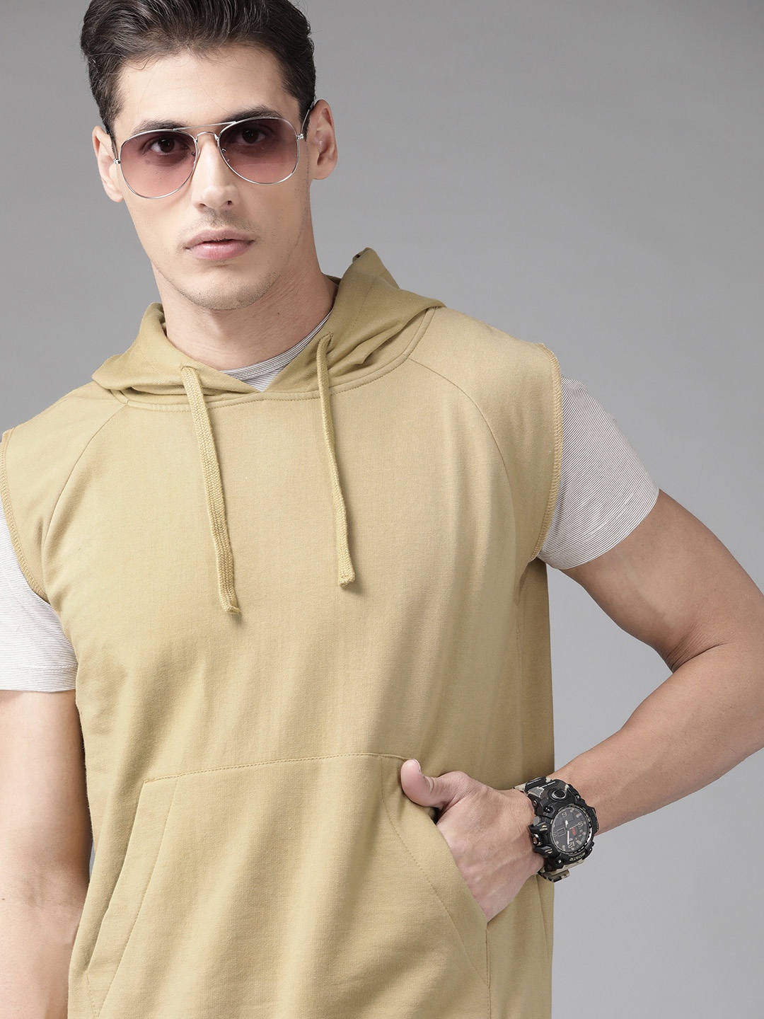 

Roadster Men Beige Solid Hooded Sweatshirt