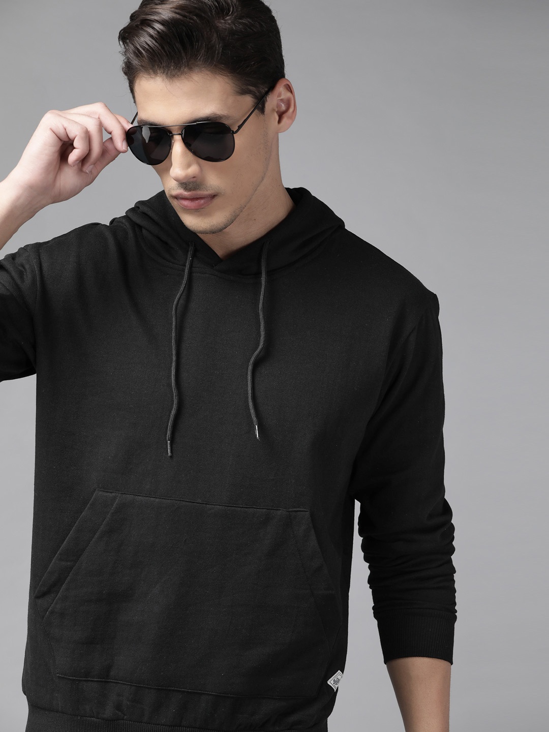 

Roadster Men Black Solid Hooded Sweatshirt