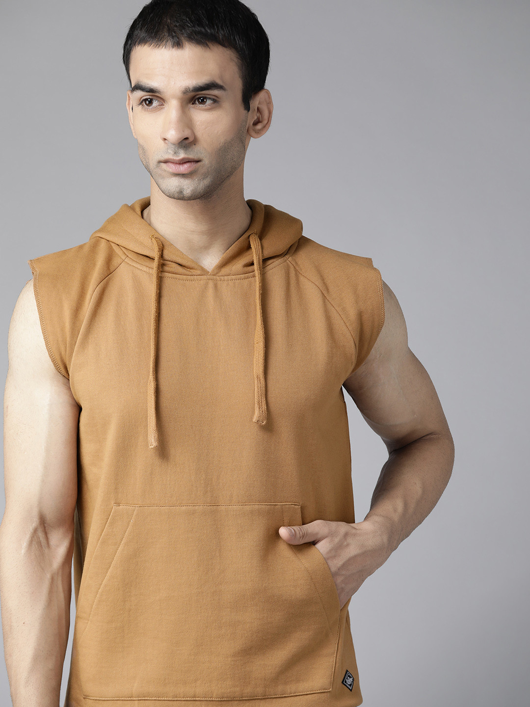 

Roadster Men Brown Solid Hooded Sweatshirt