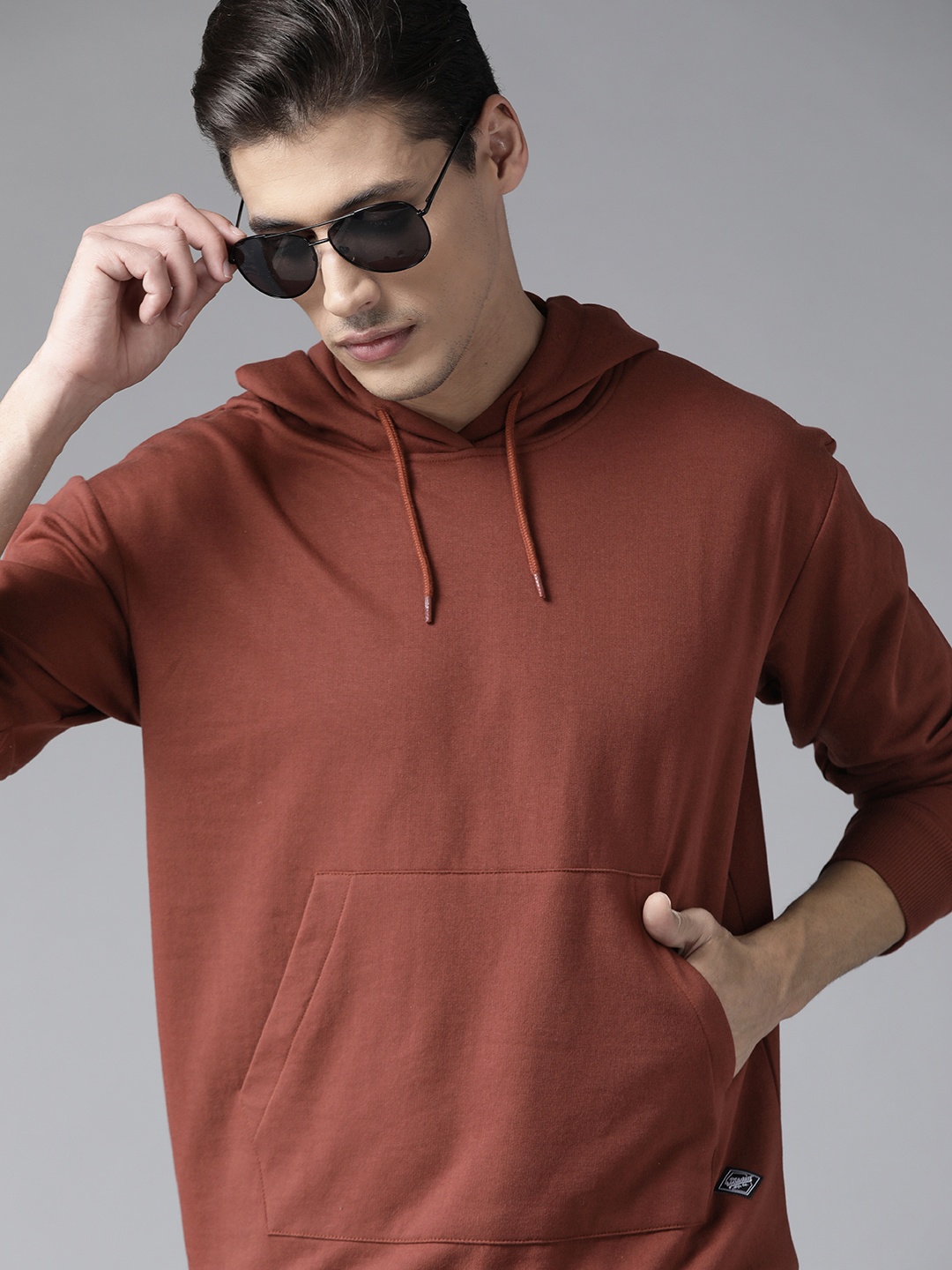 

Roadster Men Brown Solid Hooded Sweatshirt