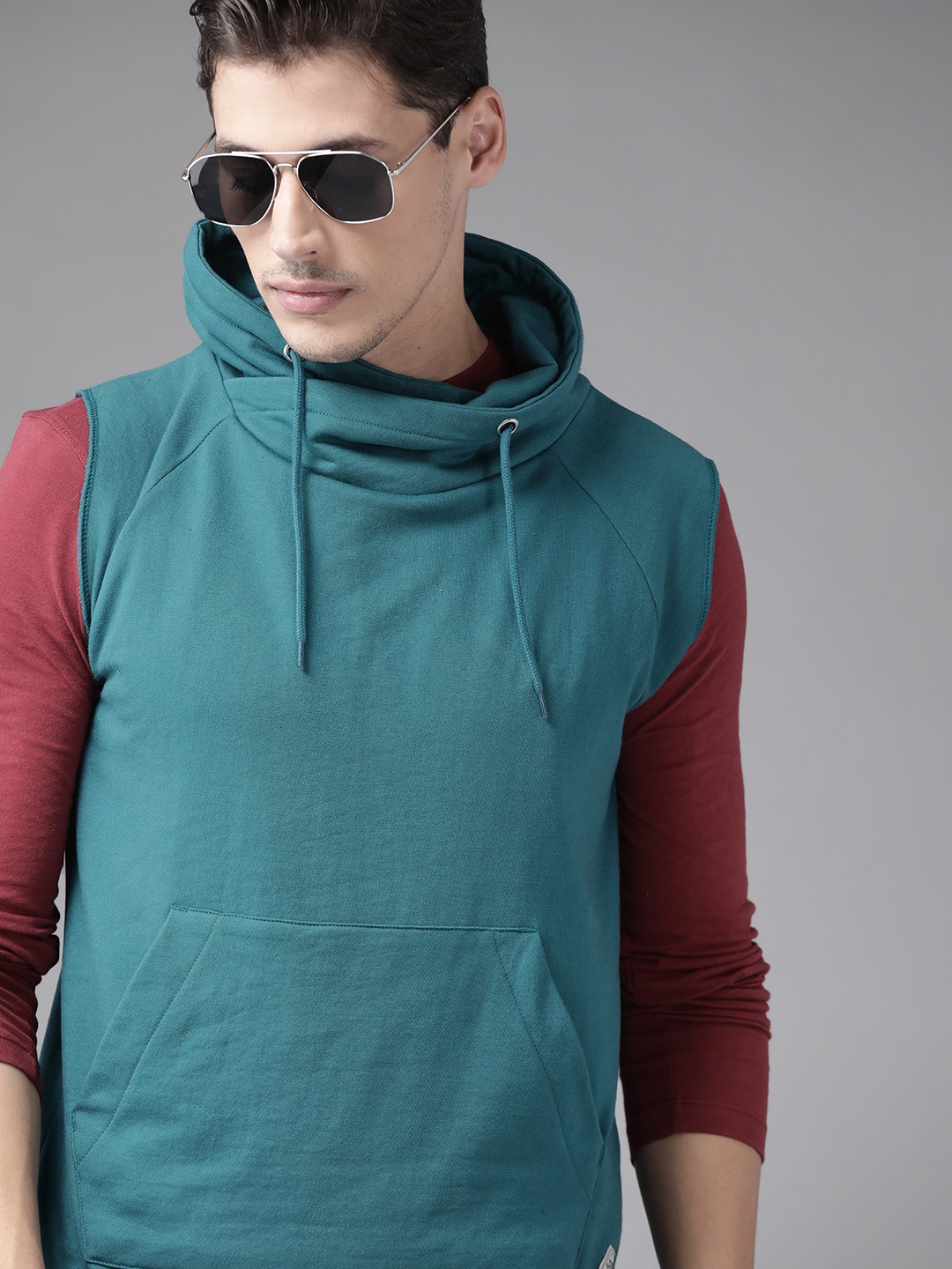 

Roadster Men Teal Green Solid Sweatshirt
