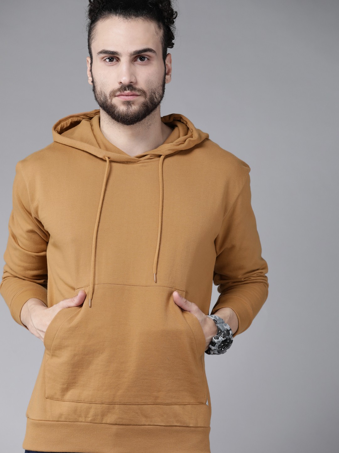 

Roadster Men Khaki Solid Hooded Sweatshirt
