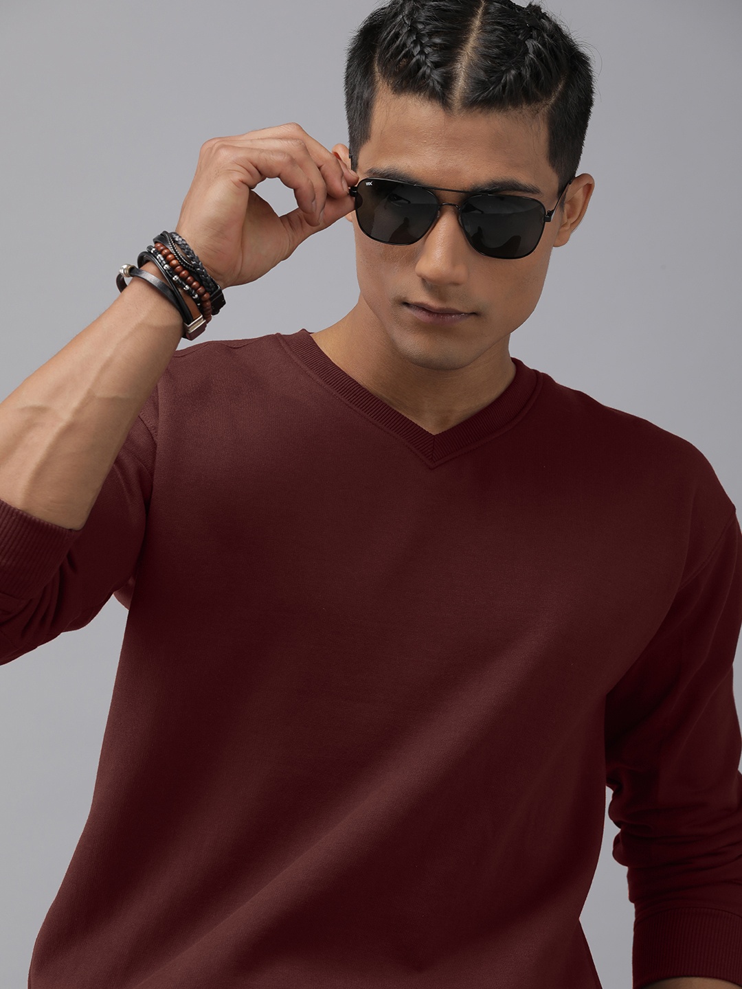 

Roadster Men Maroon Solid Sweatshirt