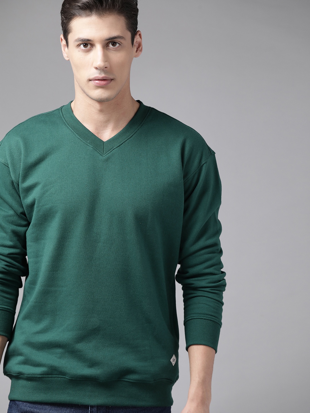 

Roadster Men Green Solid Sweatshirt