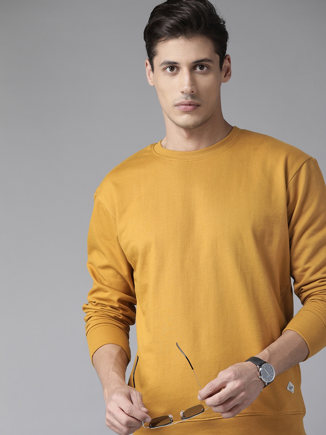 

Roadster Men Mustard Yellow Solid Sweatshirt