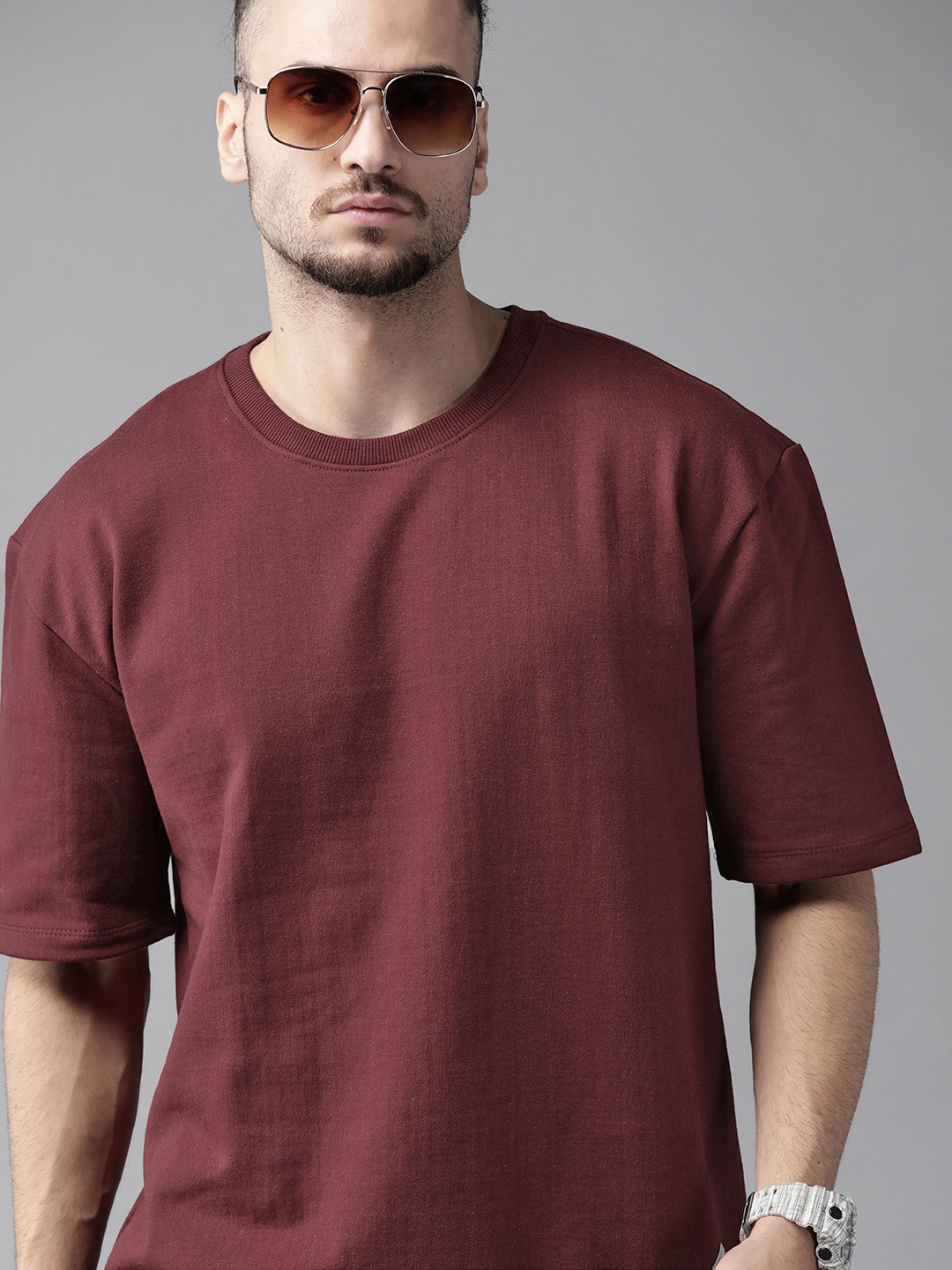 

Roadster Men Maroon Solid Sweatshirt