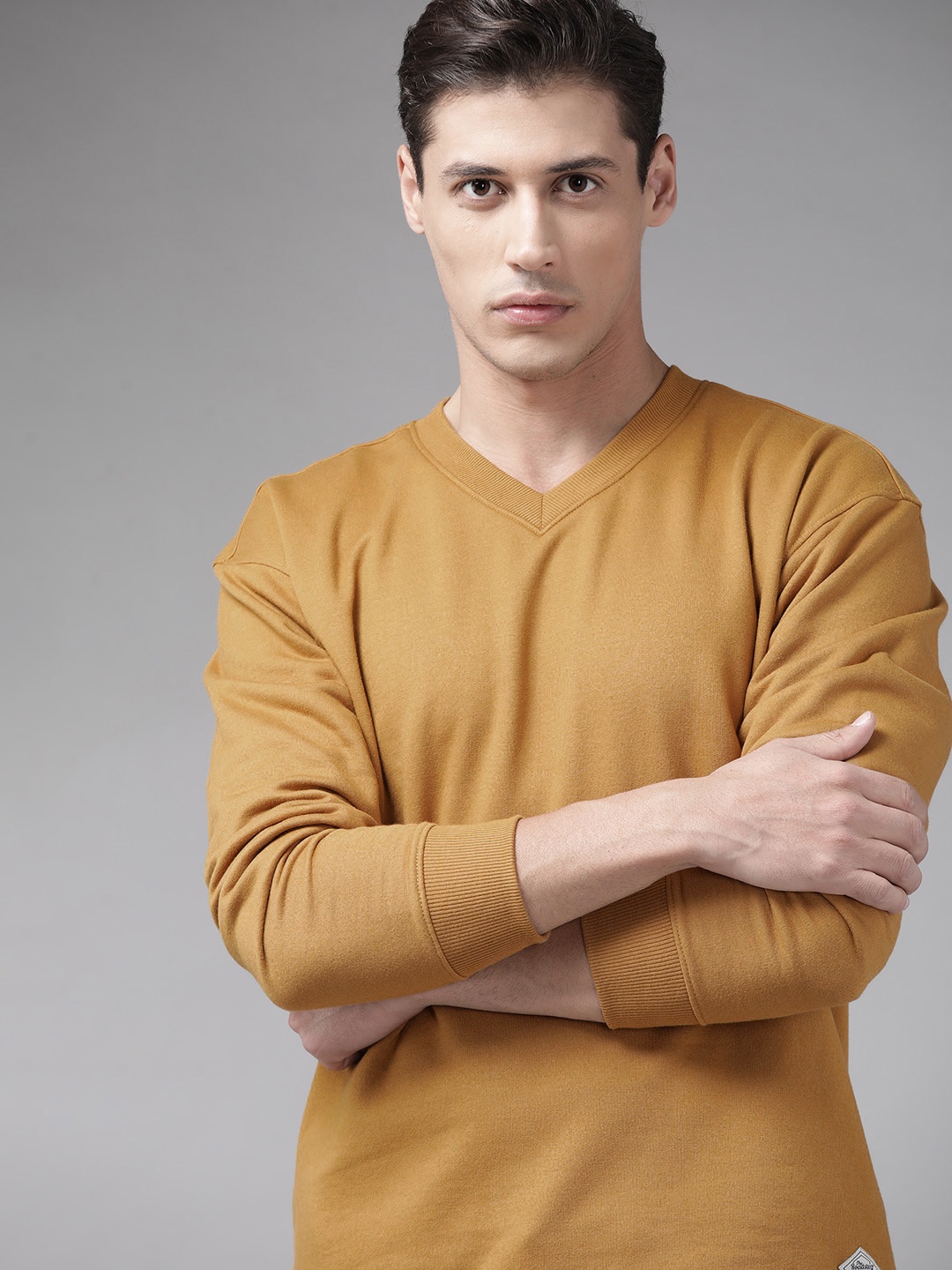 

Roadster Men Mustard Yellow Solid Sweatshirt