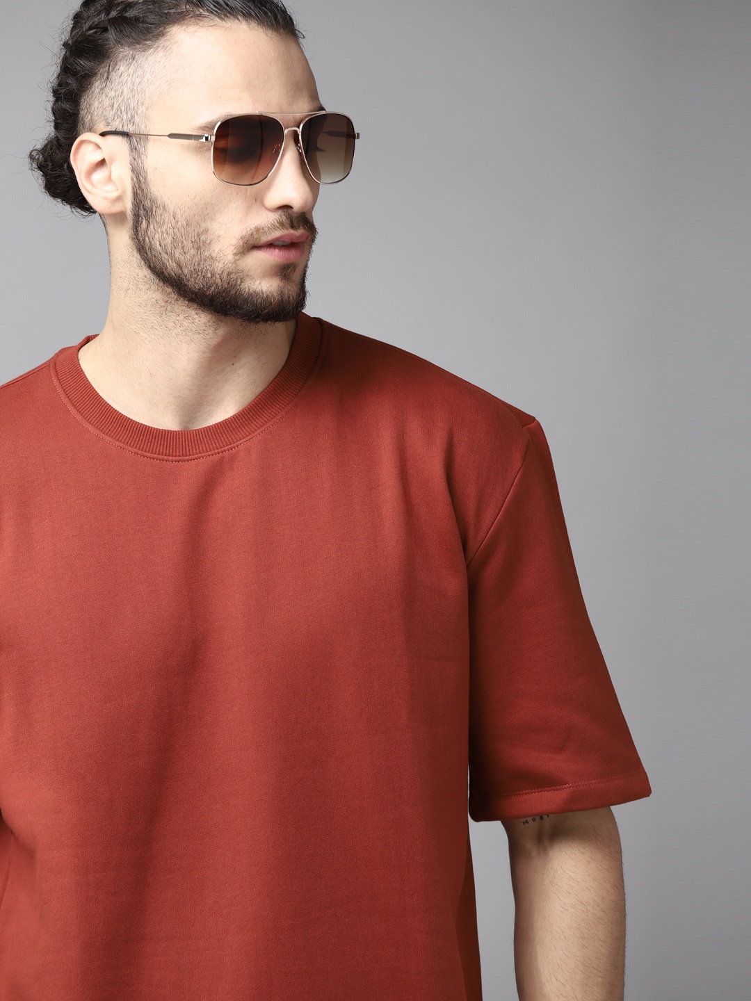 

Roadster Men Rust Red Solid Sweatshirt