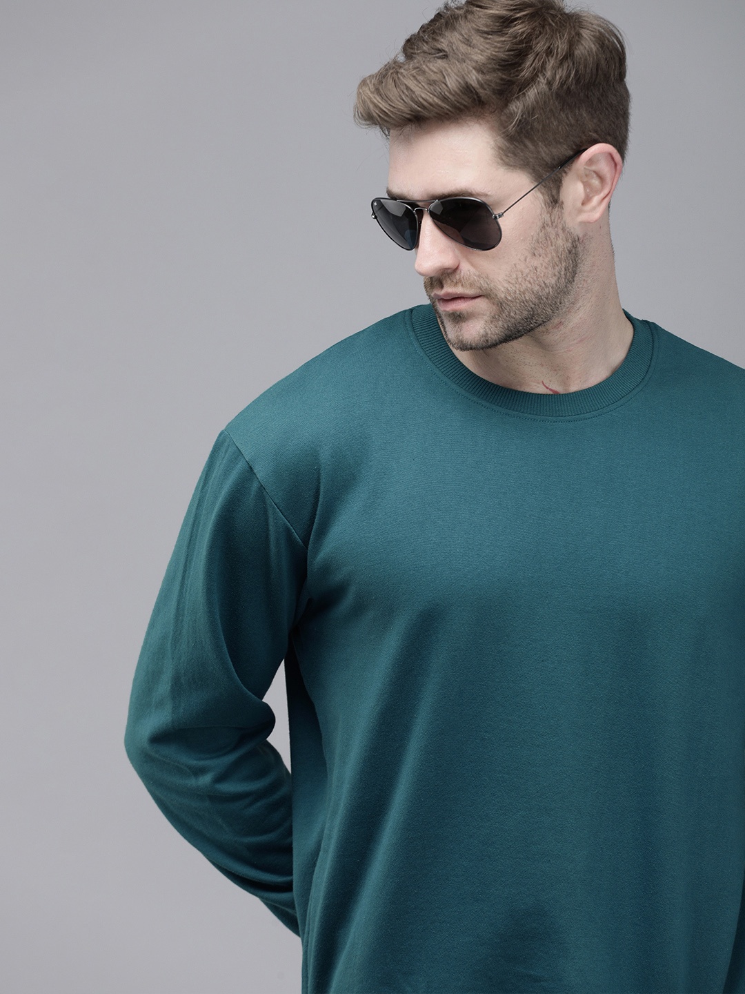 

Roadster Men Teal Blue Solid Round-Neck Pullover Sweatshirt