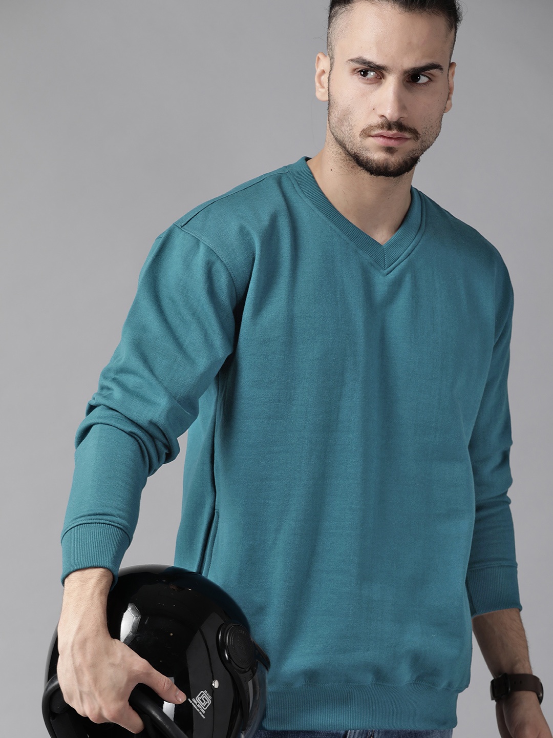 

Roadster Men Teal Green Solid Sweatshirt