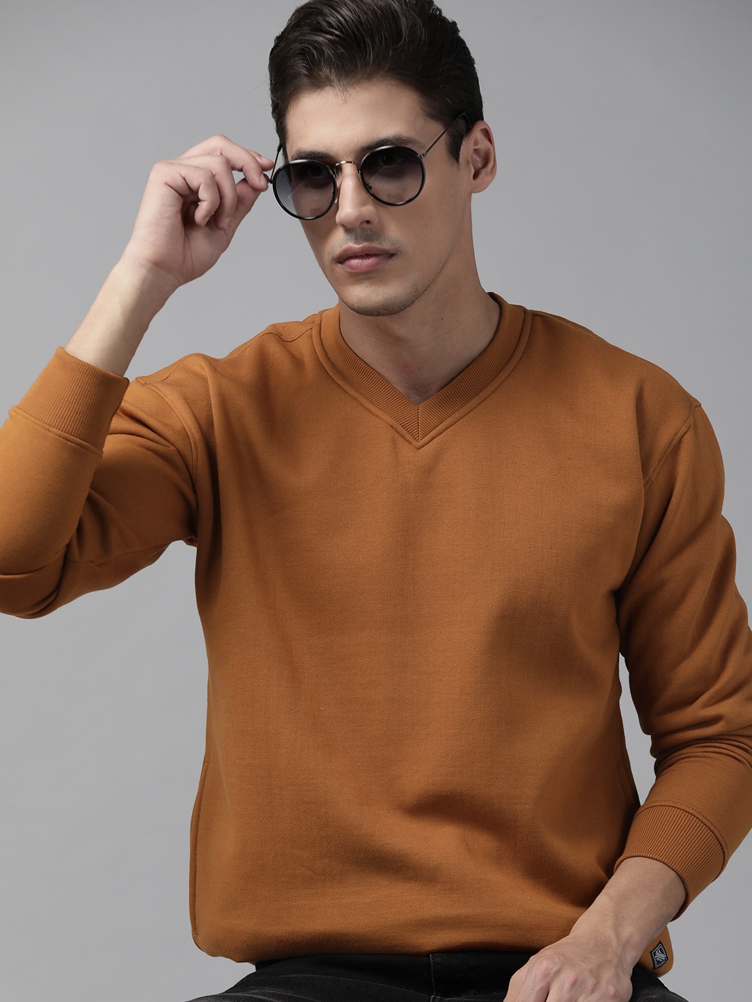

Roadster Men Mustard Brown Solid Sweatshirt