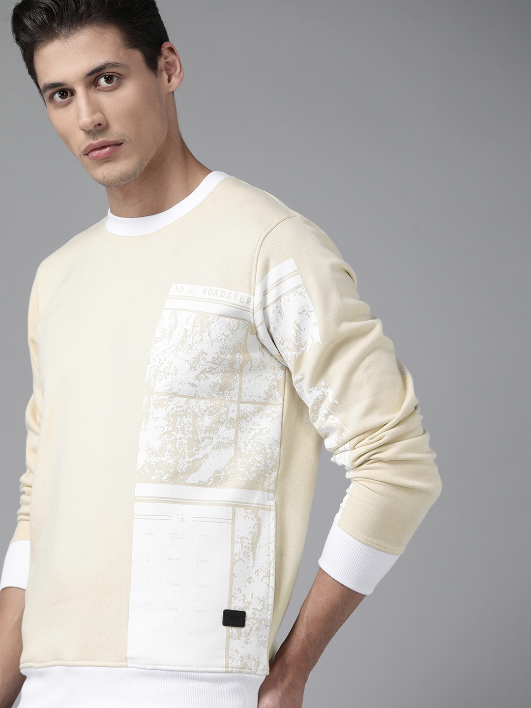 

Roadster Men Beige & White Printed Sweatshirt