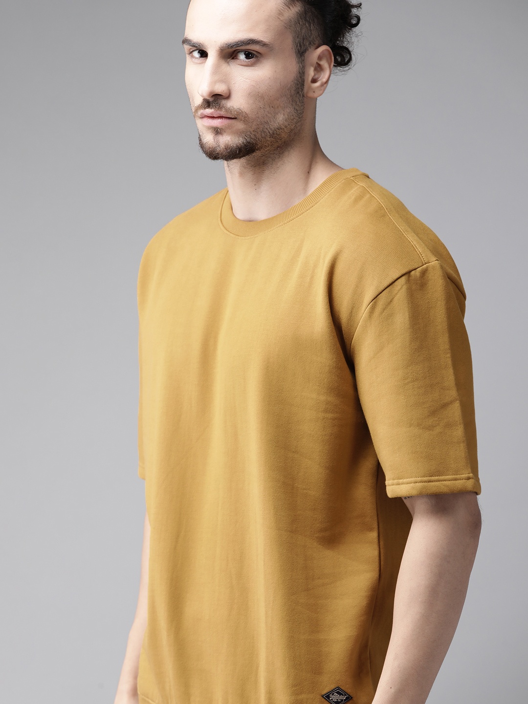 

Roadster Men Mustard Brown Solid Sweatshirt